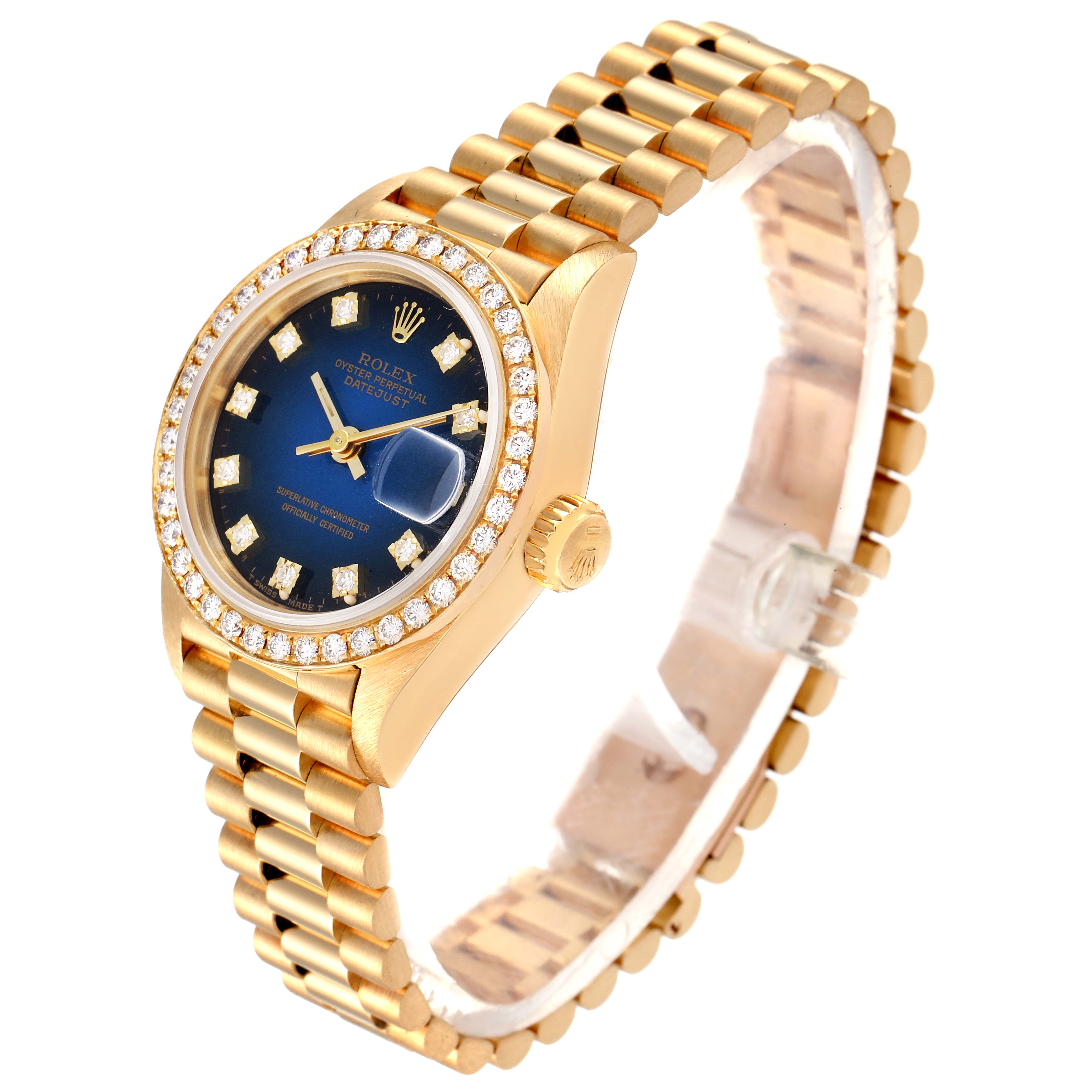 The Rolex President 69138 Women's Yellow Gold Blue Dial 69138 Women's Yellow Gold Blue Dial model watch is shown at an angled view, highlighting its blue dial, diamond bezel, and gold bracelet.