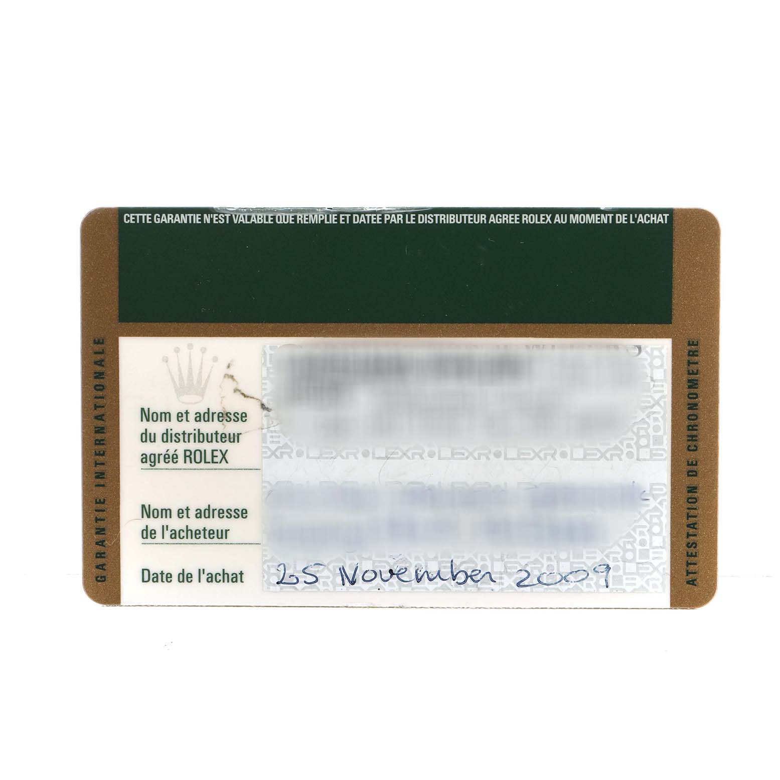 This image shows the warranty card for the Rolex Sea-Dweller 116660 Men's Stainless Steel Black Dial, featuring purchase details like the date and distributor information.