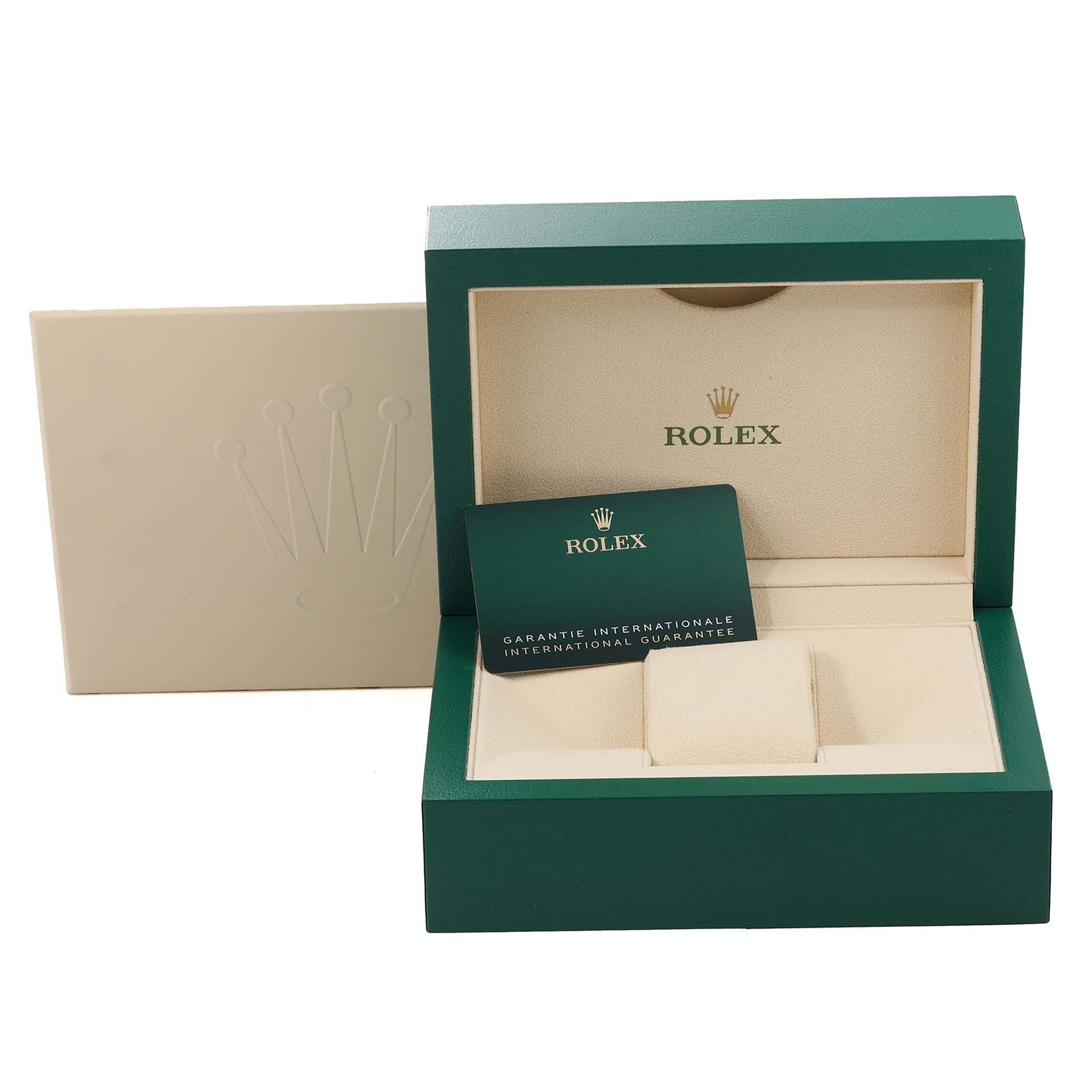 The image shows an open green and beige Rolex watch box with a guarantee card inside, for the Sea-Dweller model.