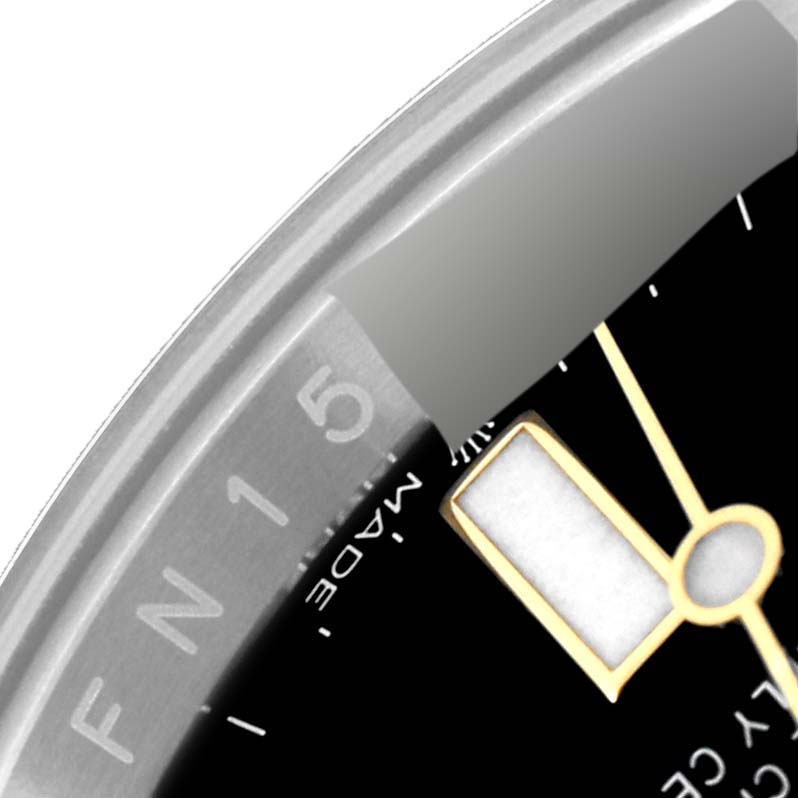 This close-up image of the Rolex Submariner 126613 Men's Steel and Gold (two tone) Black Dial 126613 Men's Steel and Gold (two tone) Black Dial shows a partial view of the dial, seconds hand, and the edge of the bezel.