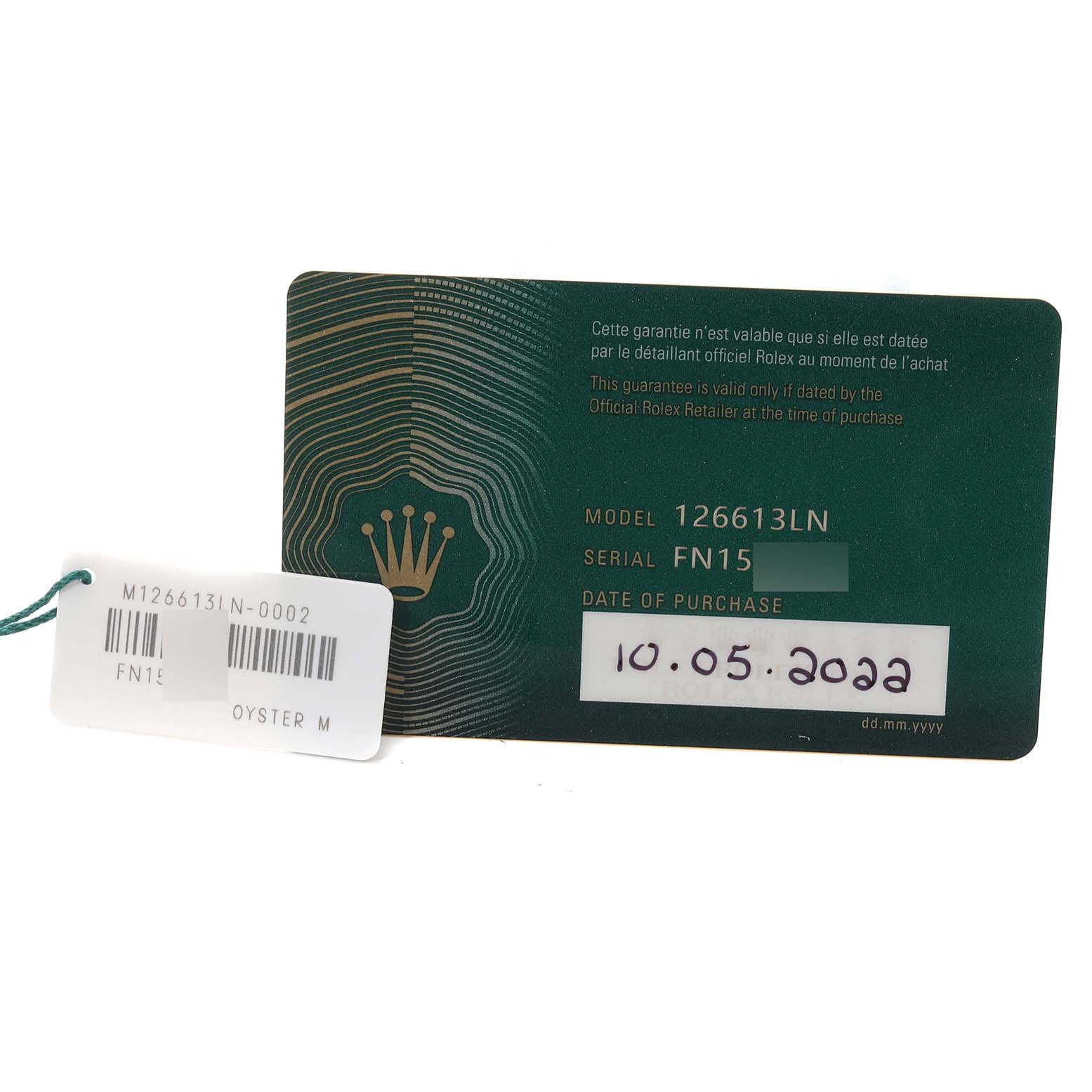 The image shows the warranty card and tag for a Rolex Submariner 126613 Men's Steel and Gold (two tone) Black Dial 126613 Men's Steel and Gold (two tone) Black Dial model 126613LN, with a marked purchase date.
