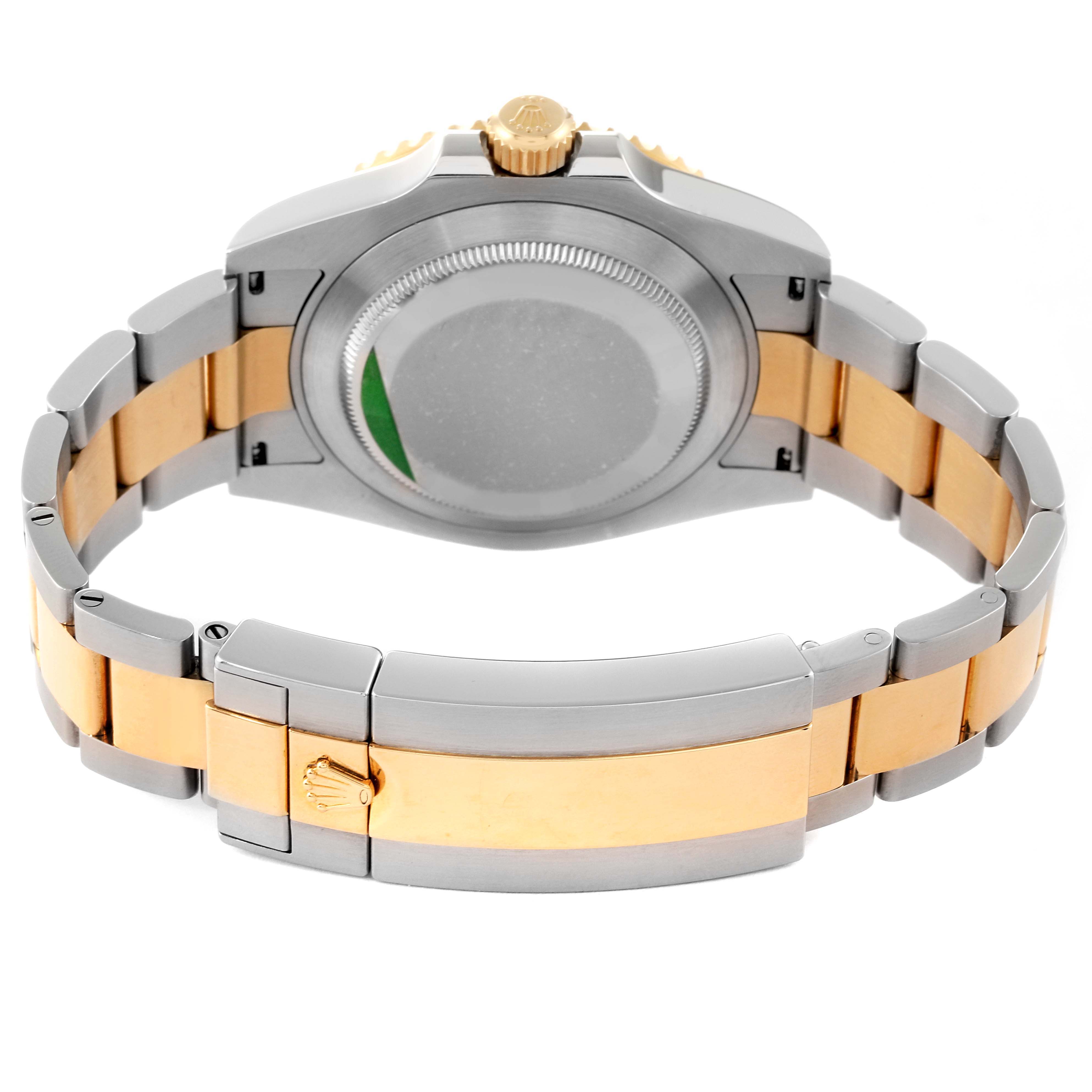 The image shows the case back and bracelet of a Rolex Submariner 126613 Men's Steel and Gold (two tone) Blue Dial 126613 Men's Steel and Gold (two tone) Blue Dial watch from a rear angle.