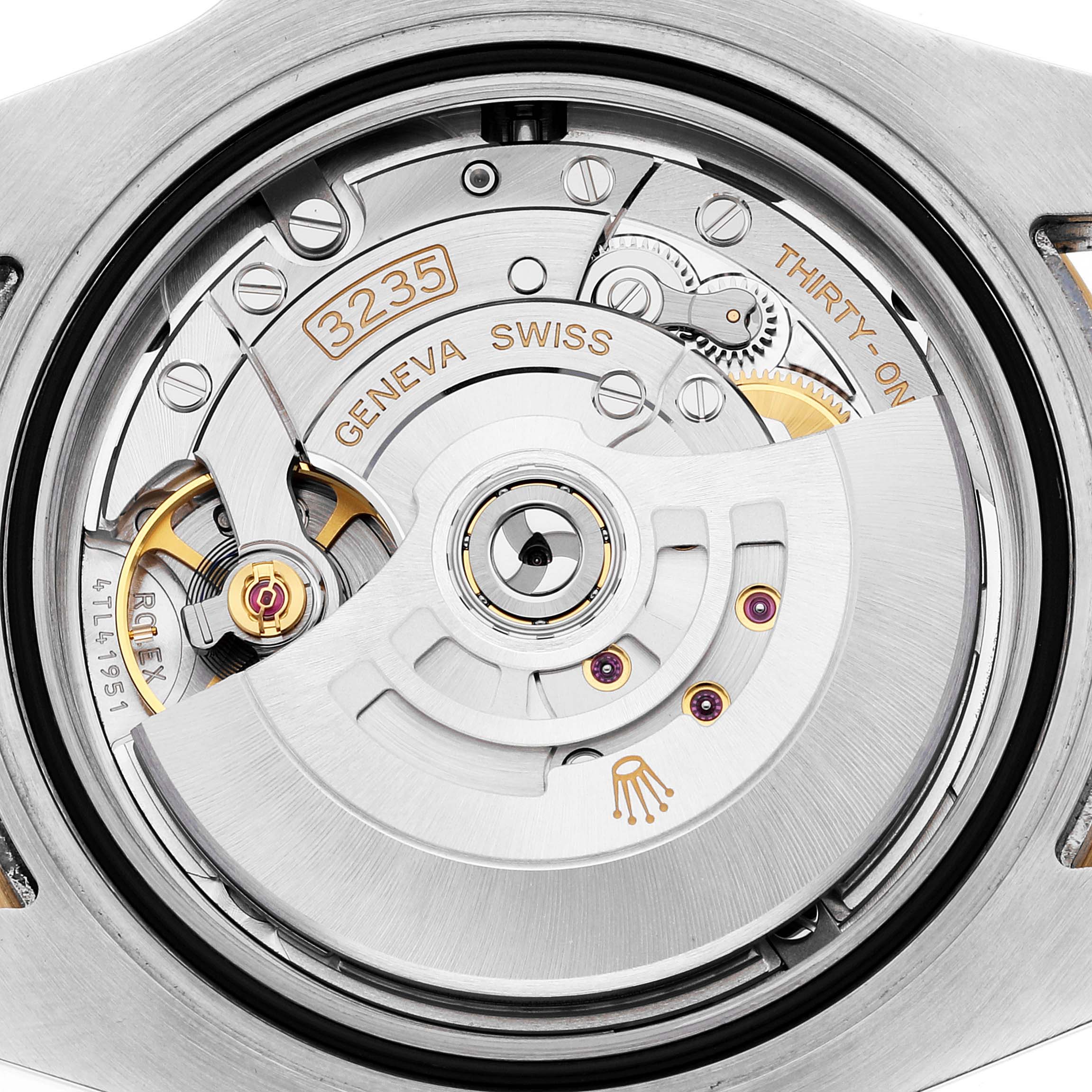 The image shows the movement and internal mechanics of the Rolex Submariner 126613 Men's Steel and Gold (two tone) Blue Dial 126613 Men's Steel and Gold (two tone) Blue Dial watch from a back view angle.