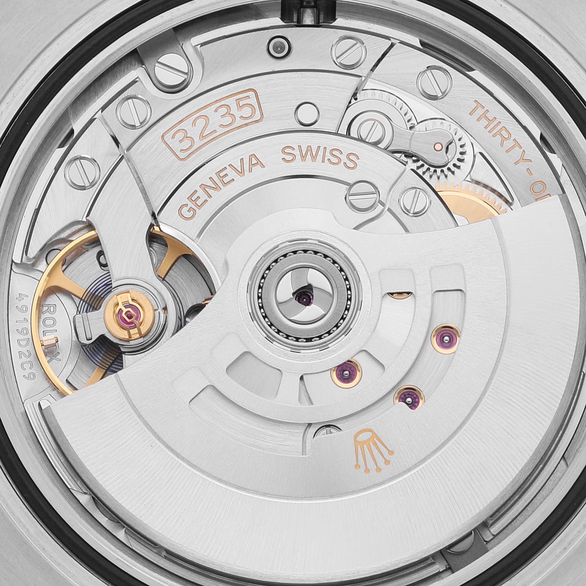 This image shows a close-up view of the Rolex Submariner 126610LV Men
s Stainless Steel Black Dial 126610LV Men
s Stainless Steel Black Dial
s Caliber 3235 movement components.