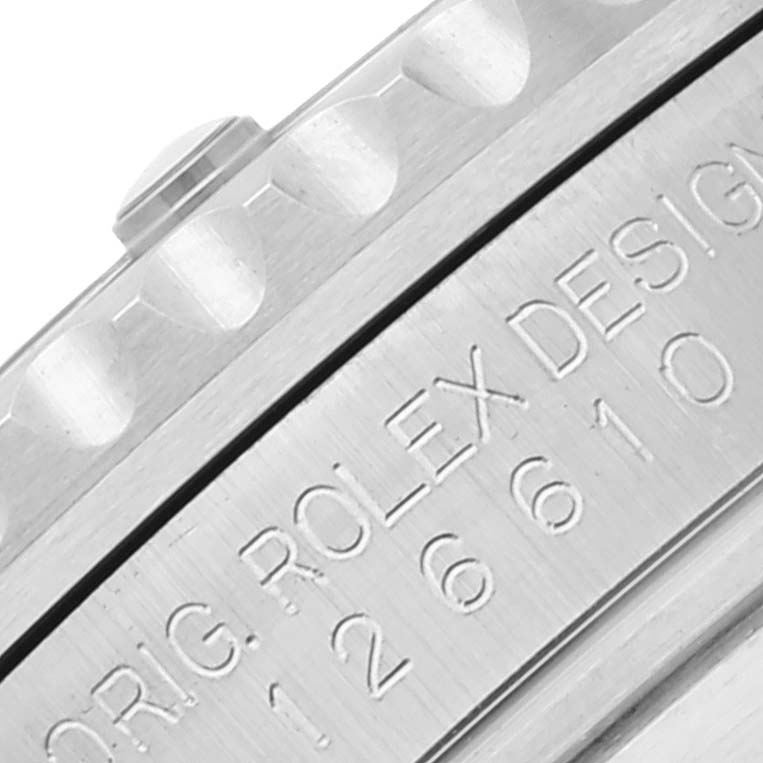 The image shows a close-up view of the engraved side of the bezel and case of a Rolex Submariner 126610LV Men
s Stainless Steel Black Dial 126610LV Men
s Stainless Steel Black Dial watch.