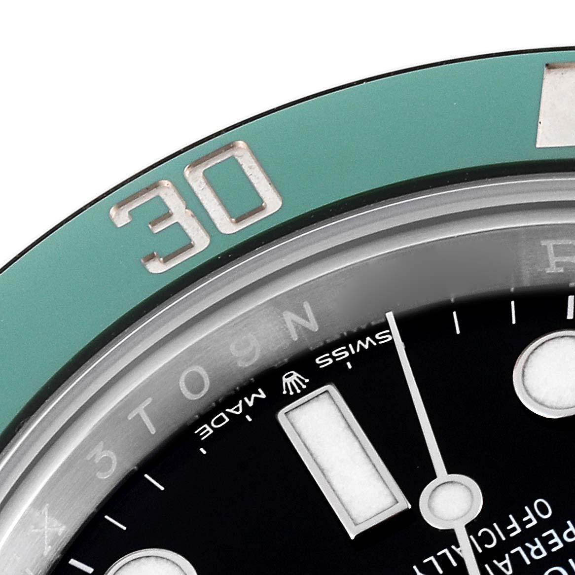 This image shows a close-up of the bezel and partial face of a Rolex Submariner 126610LV Men's Stainless Steel Black Dial 126610LV Men's Stainless Steel Black Dial watch, focusing on the 30-minute marker.