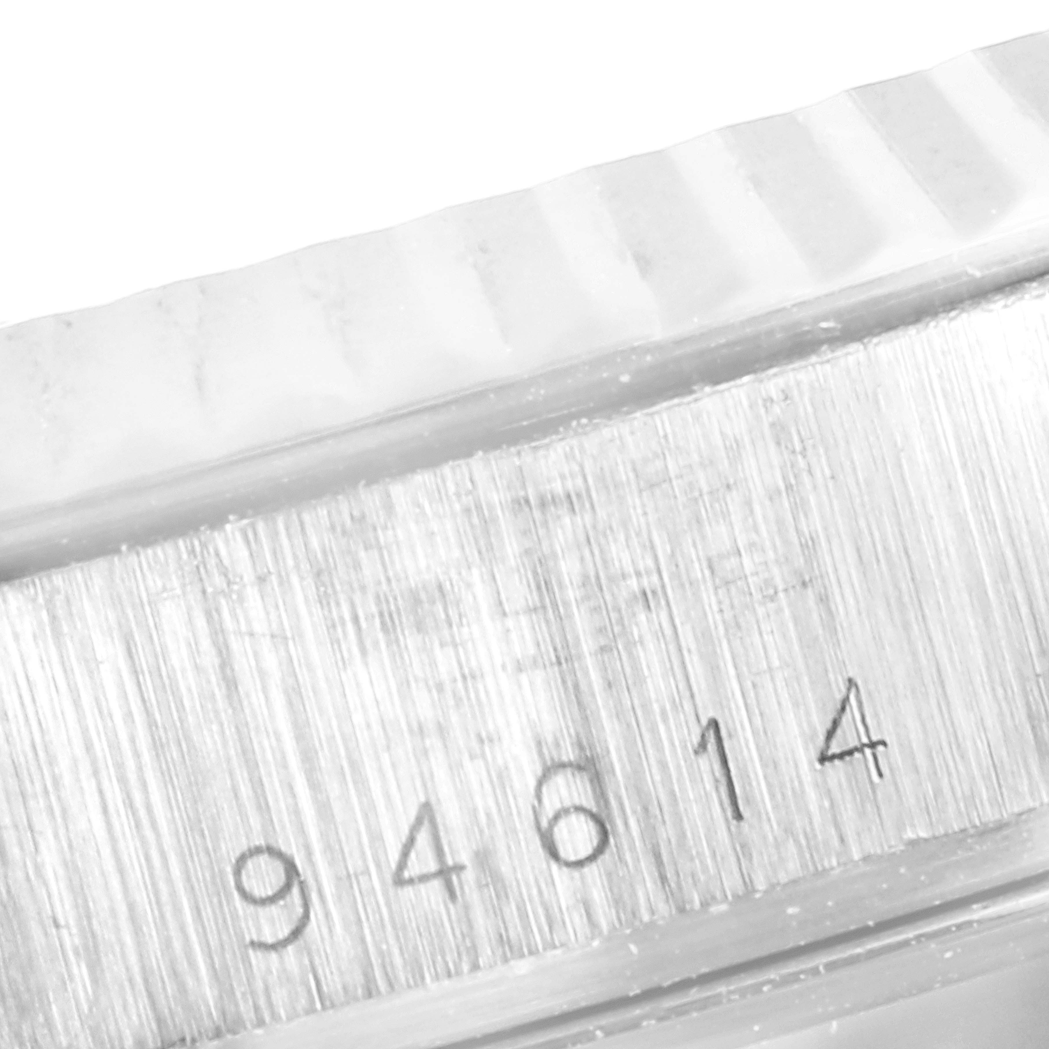 This image shows a close-up of the serial number engraved on the case side of a Tudor Prince 94614 Men's Stainless Steel Silver Dial 94614 Men's Stainless Steel Silver Dial watch.