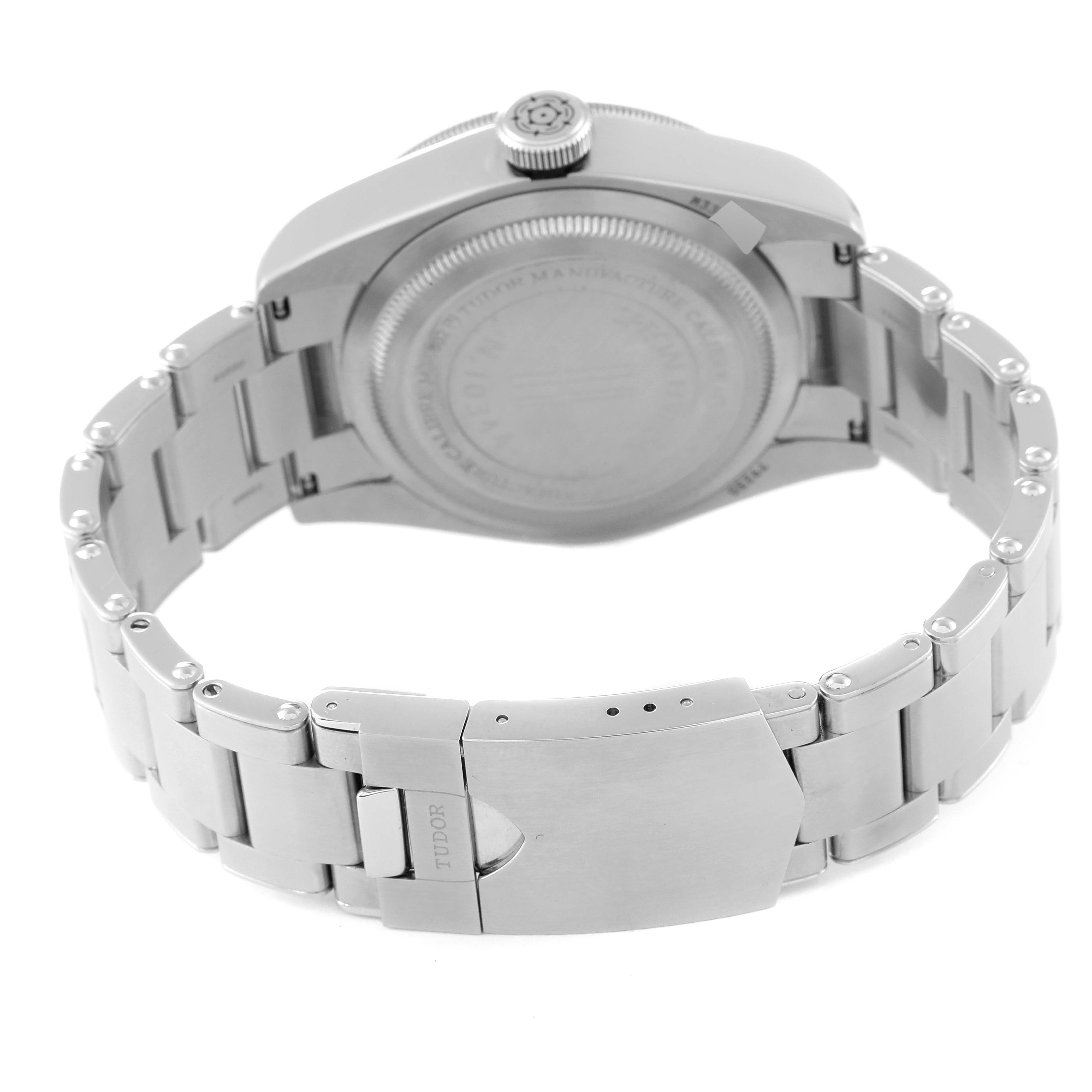 This image shows the back of the Tudor Heritage Black Bay 79230G Men's Stainless Steel Black Dial 79230G Men's Stainless Steel Black Dial watch, focusing on the clasp, bracelet, and case back.