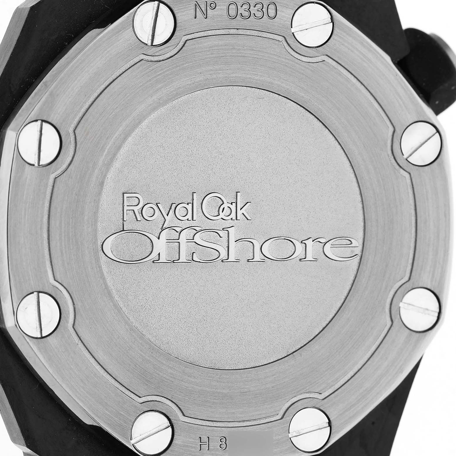 The image shows the back of the Royal Oak Offshore by Audemars Piguet, highlighting the case back with screws and engravings.