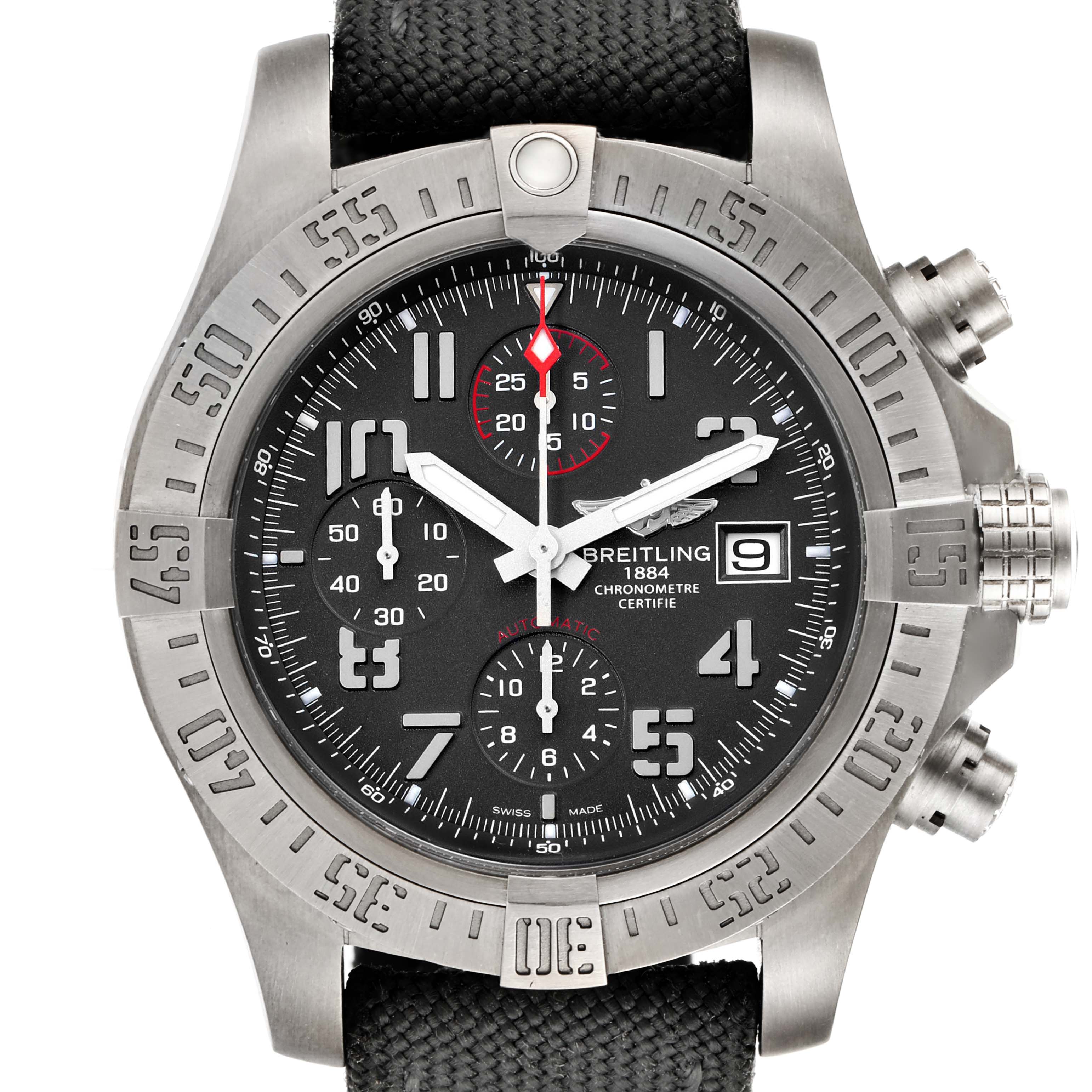 The image shows a front view of a Breitling Avenger E1338310/M536-109W Men's Titanium Grey Dial E1338310/M536-109W Men's Titanium Grey Dial model watch, featuring its black dial, chronograph subdials, and a stainless steel case.