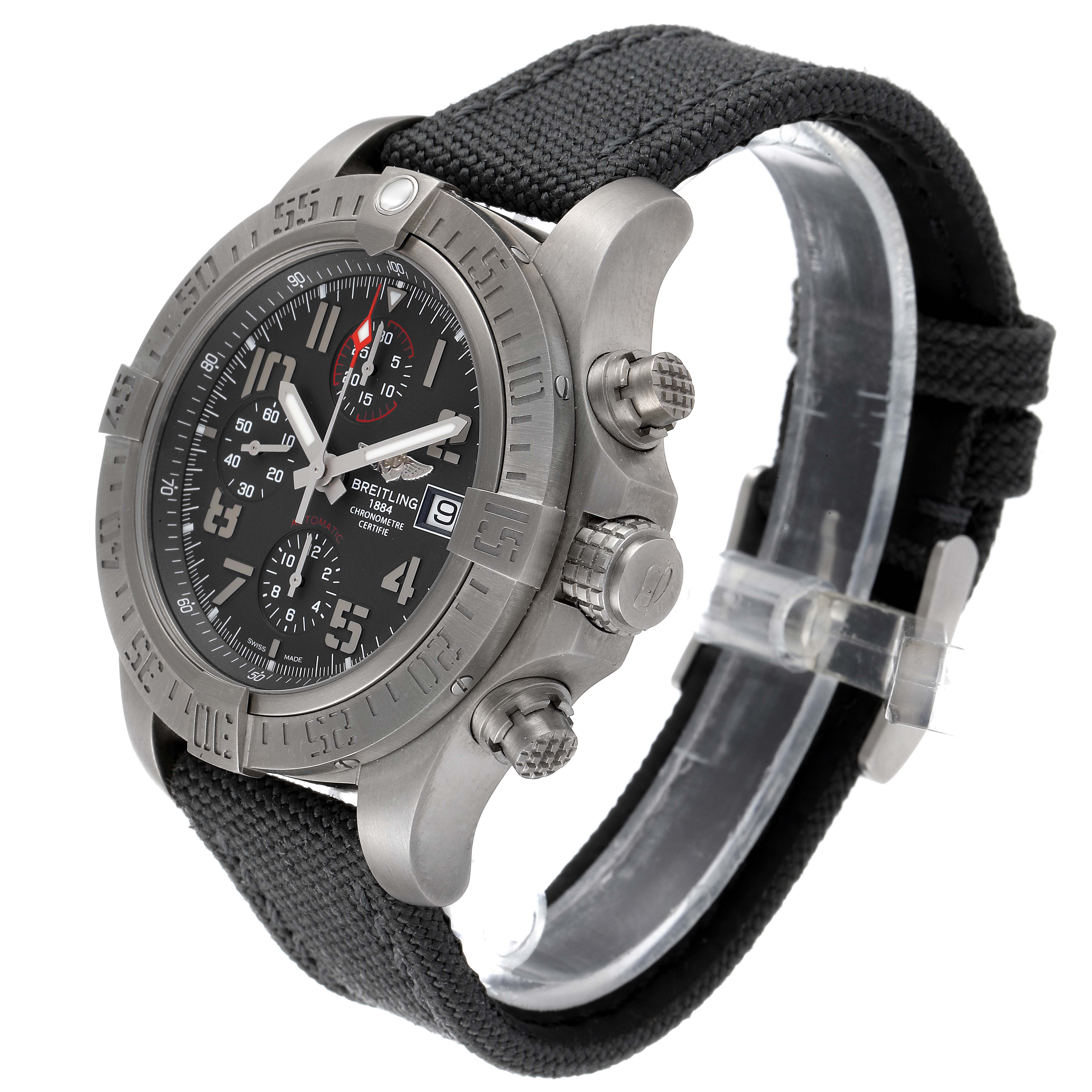 The Breitling Avenger E1338310/M536-109W Men's Titanium Grey Dial E1338310/M536-109W Men's Titanium Grey Dial watch is shown at a three-quarter angle, highlighting its dial, bezel, crown, pushers, and black strap.