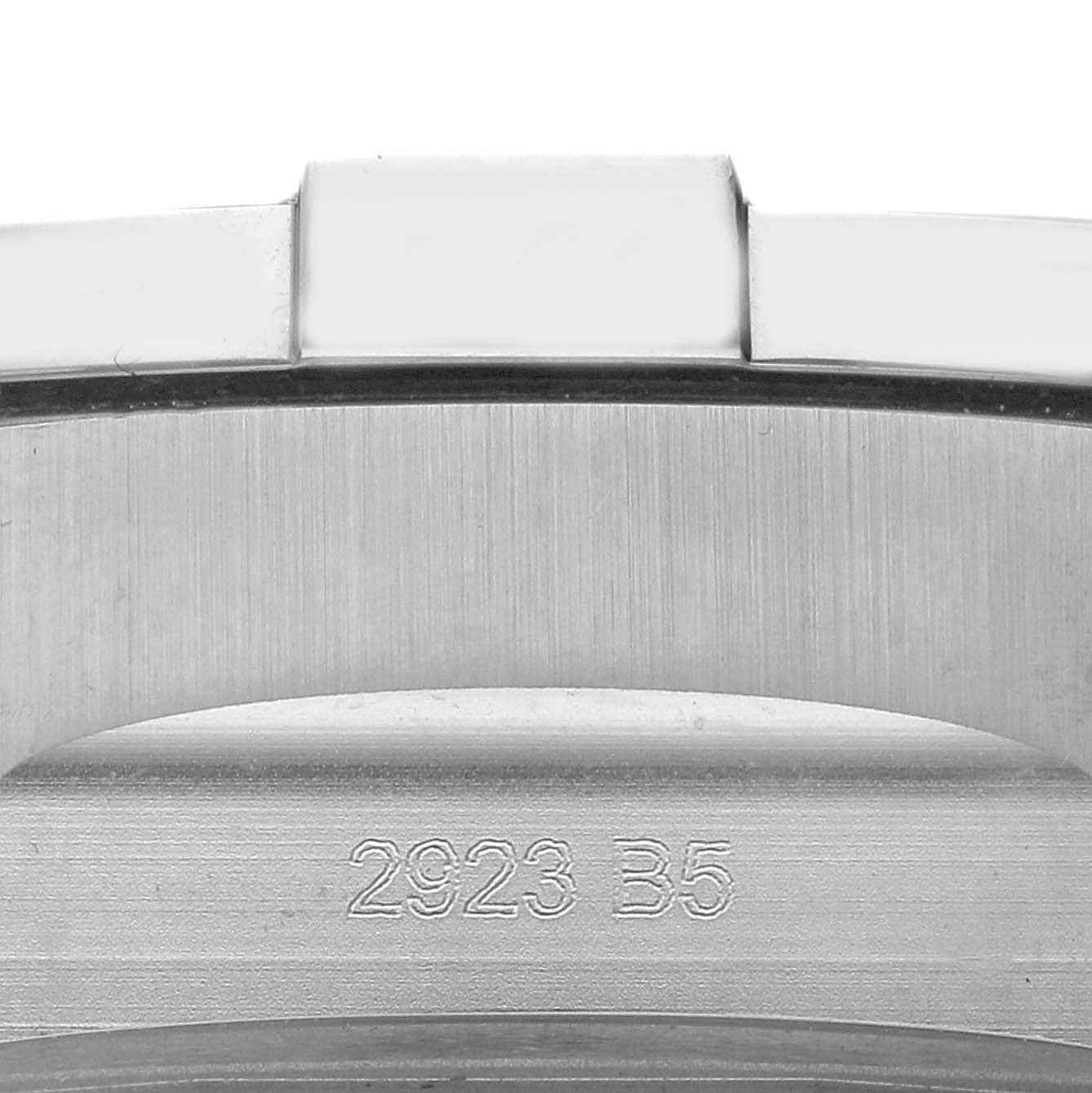 The image shows a close-up of the Breitling Avenger A24315 Men
s Stainless Steel Black Dial watch bezel with engraved numbers "2923 B5."