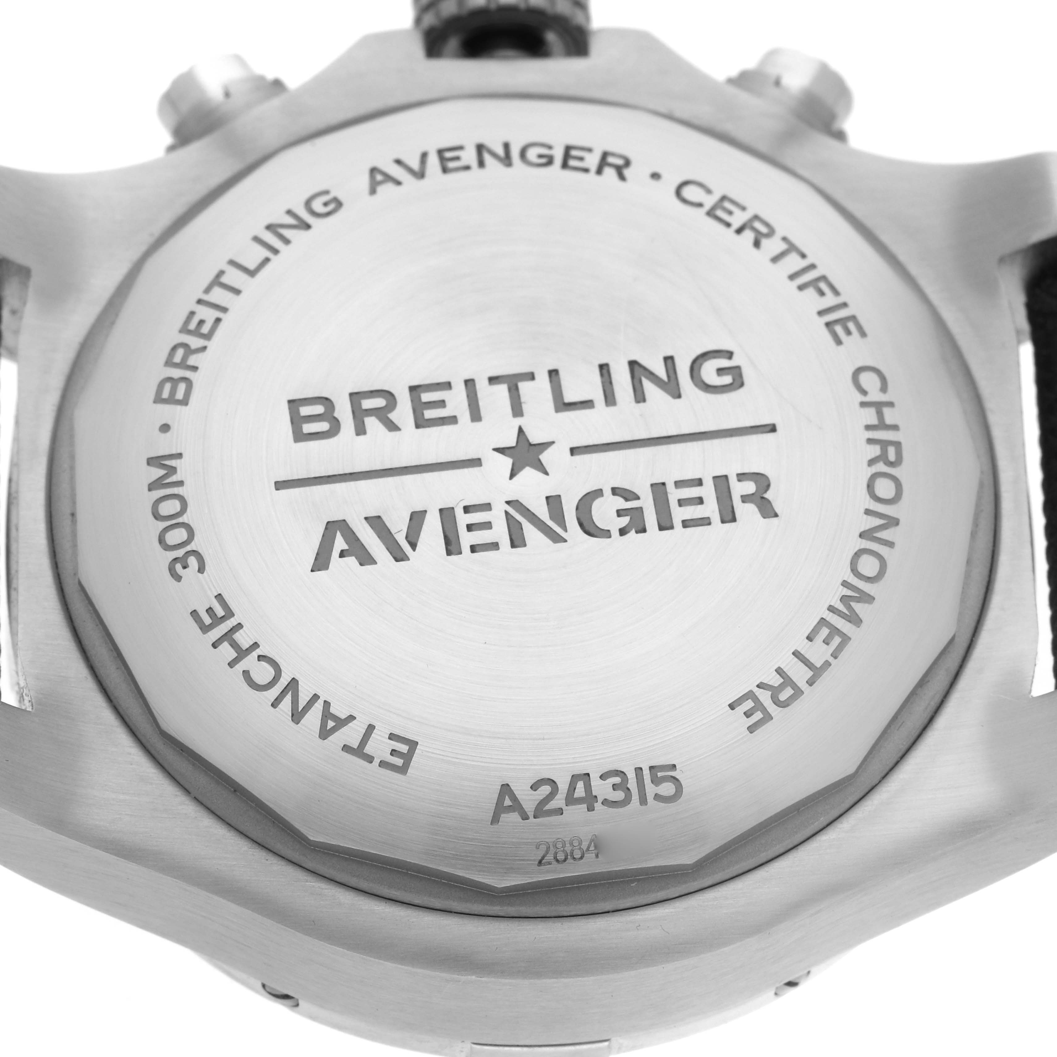 The image shows the back case of a Breitling Avenger A24315 Men
s Stainless Steel Black Dial watch, featuring engraved branding and model details.