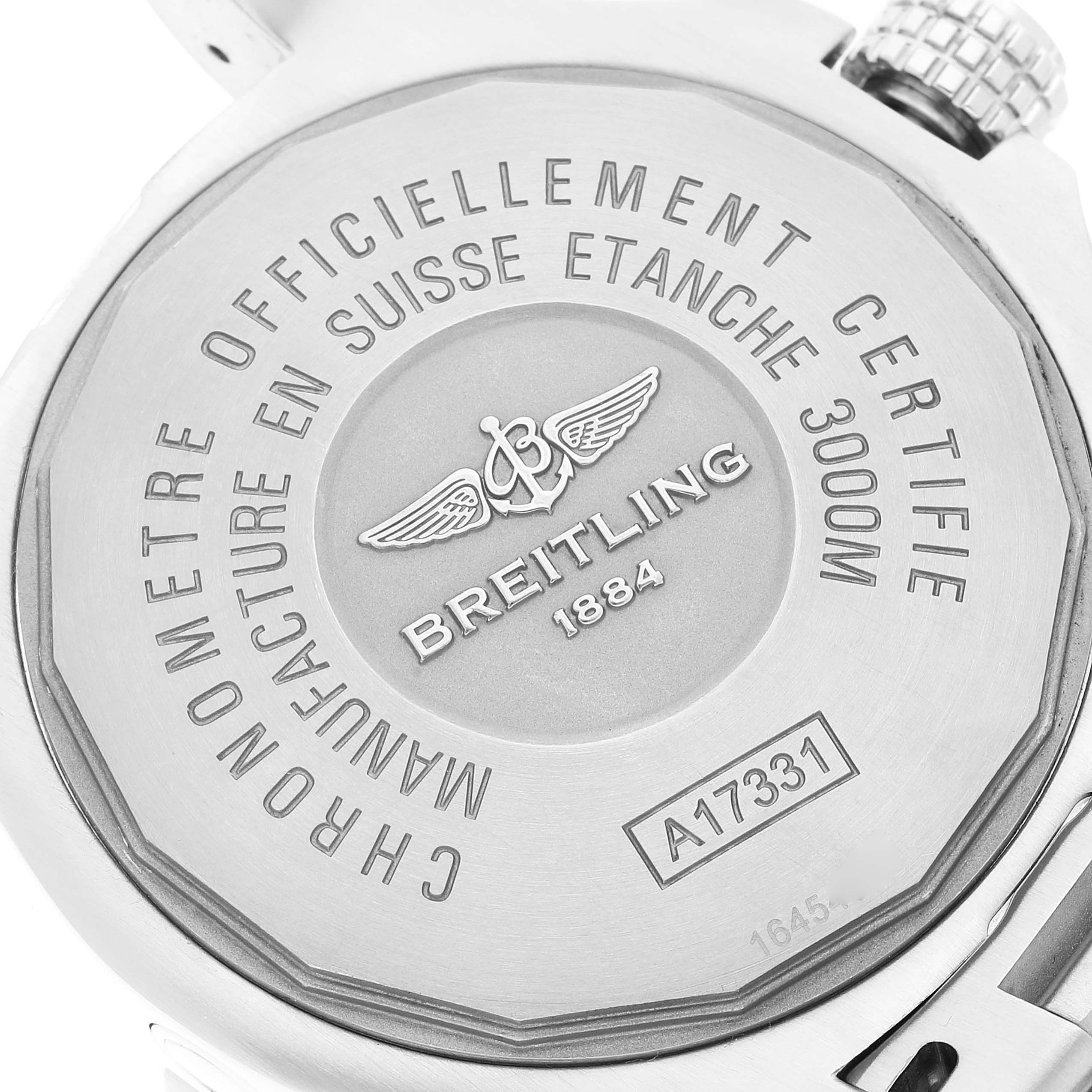 The image shows the case back of a Breitling Avenger A17331 Men's Stainless Steel Yellow Dial A17331 Men's Stainless Steel Yellow Dial watch, highlighting the engravings and logos.