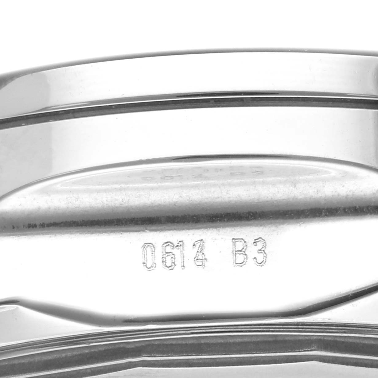 The image shows a close-up side view of the Breitling Bentley A41390 Men
s Stainless Steel Black Dial watch case, highlighting the engraved details.