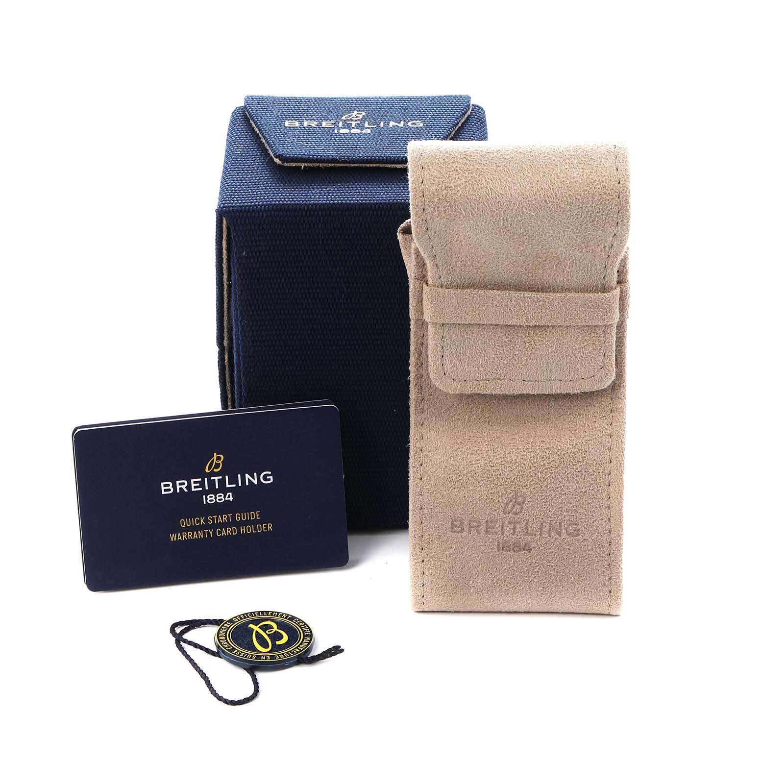 The image shows a Breitling Chronomat A32398 Men
s Stainless Steel Green Dial watch box, a suede pouch, a warranty card holder, and a tag, viewed from a front angle.