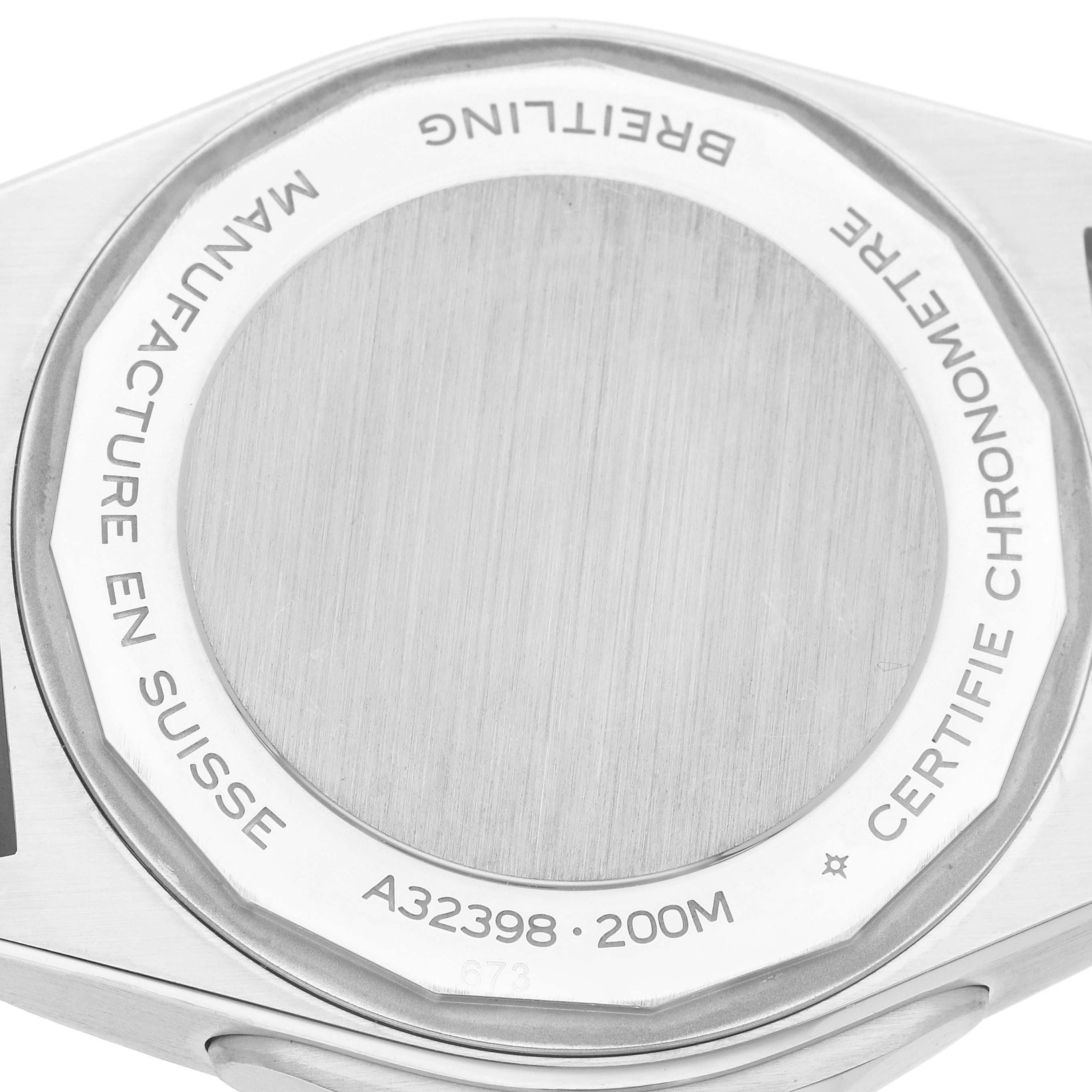 The image shows the back case of a Breitling Chronomat A32398 Men
s Stainless Steel Green Dial watch with engravings detailing its model and specifications.
