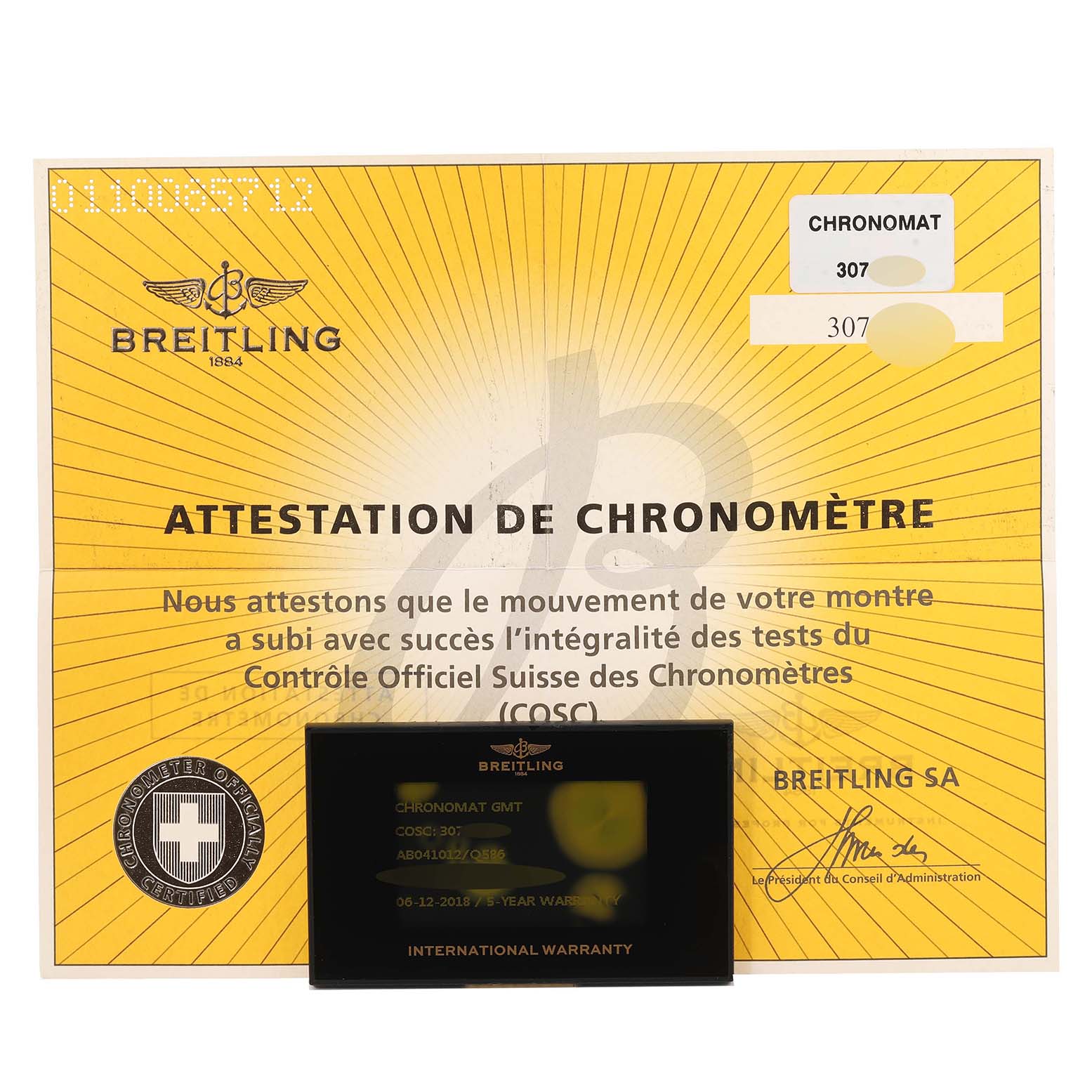 The image shows the certificate of authenticity and international warranty card for the Breitling Chronomat AB0410 Men's Stainless Steel Brown Dial AB0410 Men's Stainless Steel Brown Dial watch model.