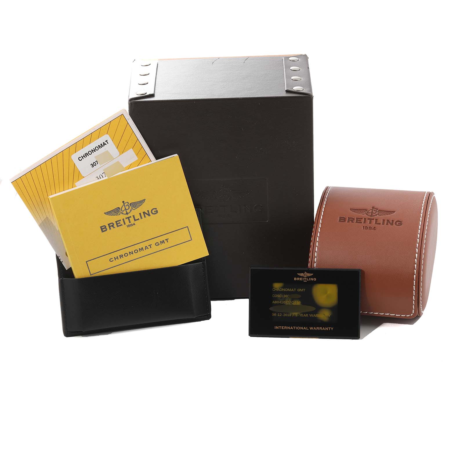 The image shows accessories for the Breitling Chronomat AB0410 Men's Stainless Steel Brown Dial AB0410 Men's Stainless Steel Brown Dial model, including a box, warranty card, manual, and a leather watch case.