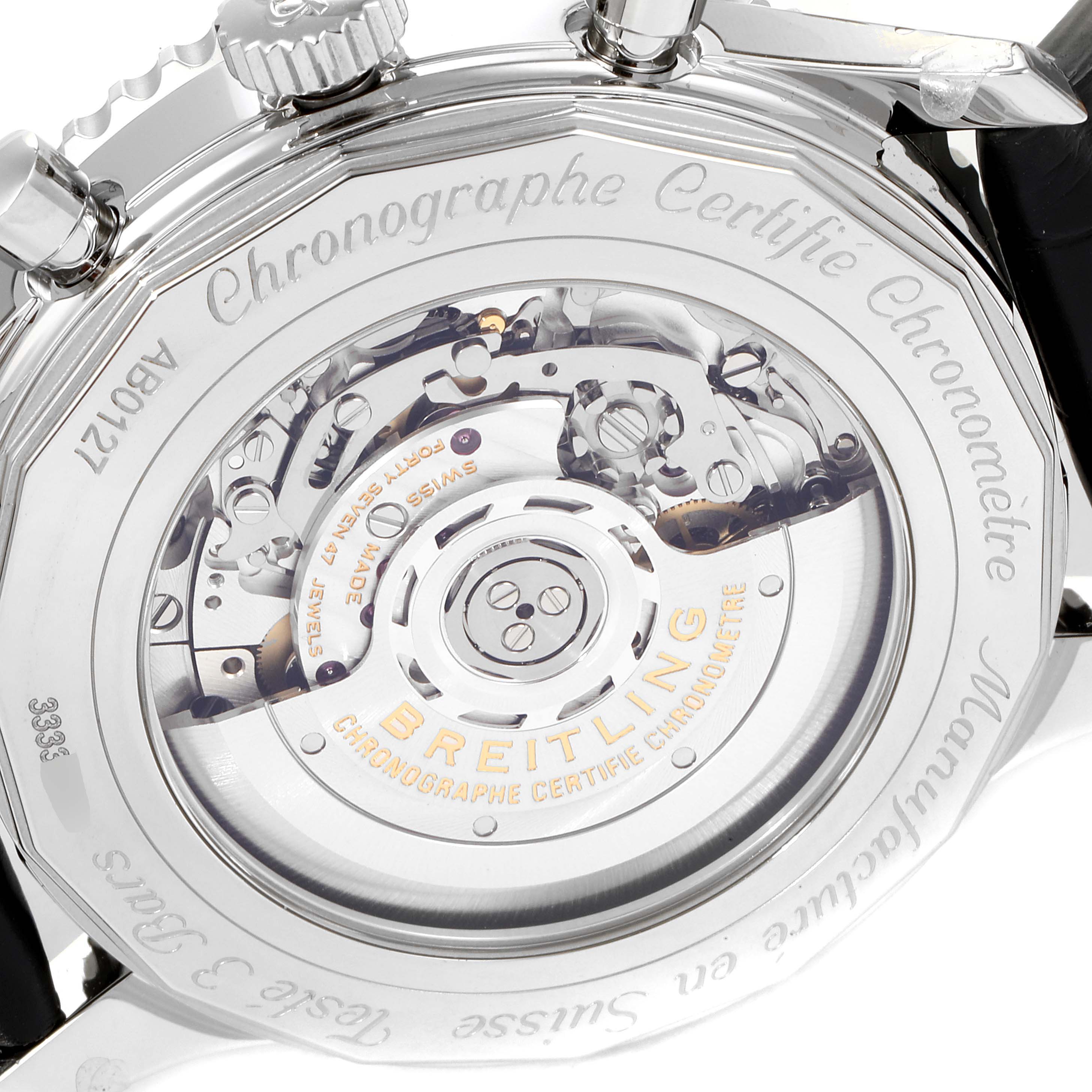 The image shows the back view of a Breitling Navitimer AB0127211C1A1 Men's Stainless Steel Black Dial AB0127211C1A1 Men's Stainless Steel Black Dial watch, prominently featuring its intricate movement and engraved case back.