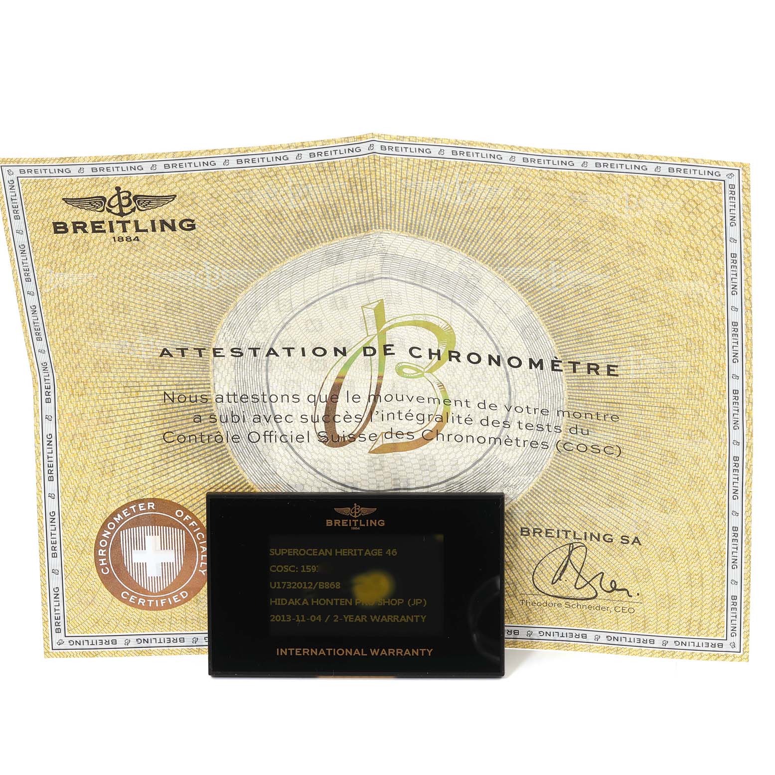 This image shows the warranty card and chronometer certificate for the Breitling Superocean U17320 Men
s Stainless Steel Black Dial U17320 Men
s Stainless Steel Black Dial model, viewed from the front.
