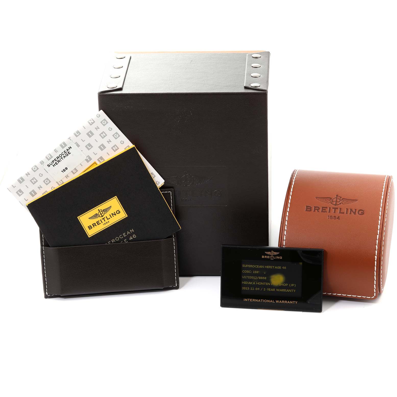 The image shows the packaging, manuals, and warranty card for a Breitling Superocean U17320 Men
s Stainless Steel Black Dial U17320 Men
s Stainless Steel Black Dial watch.