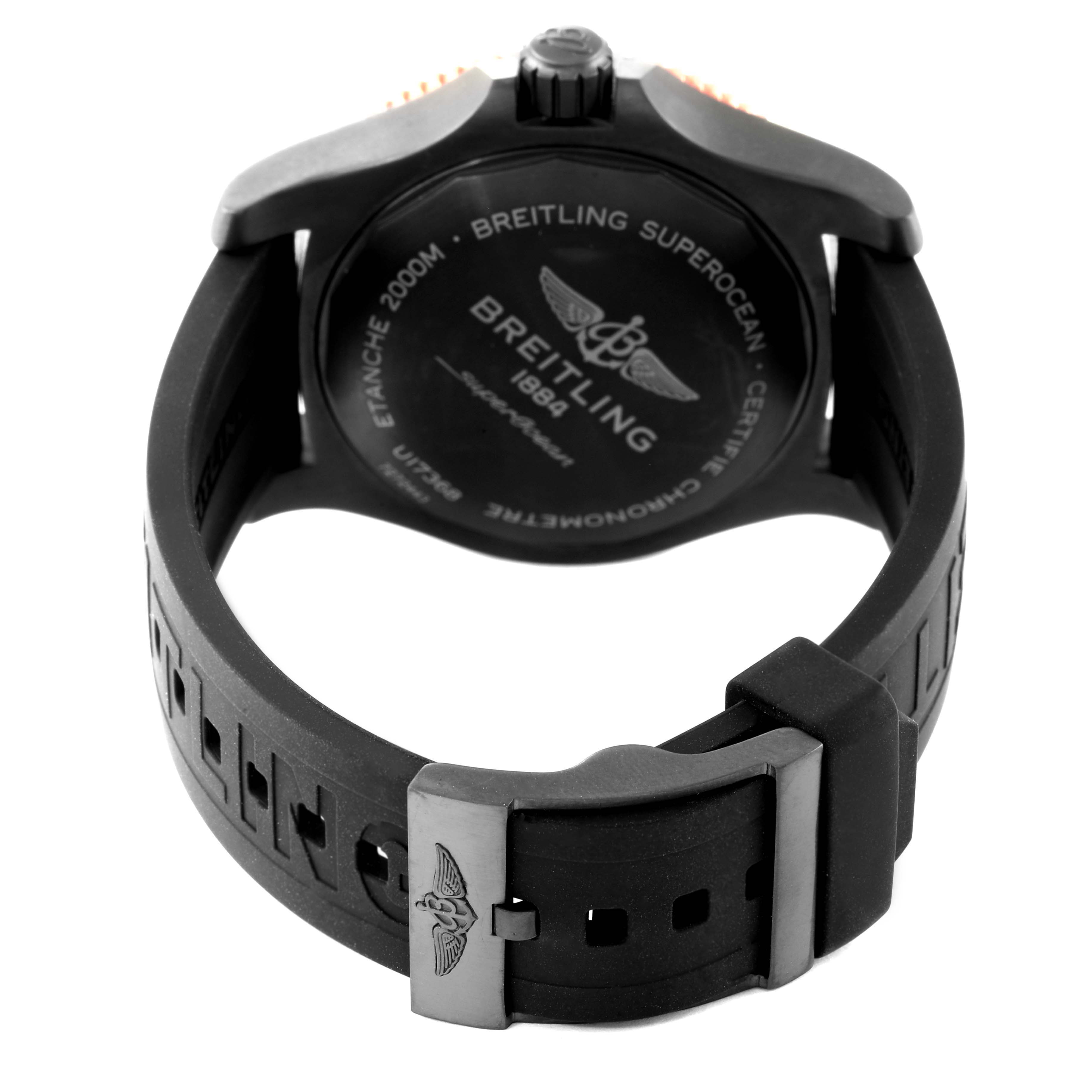 The image shows the rear view of a Breitling Superocean U17368 Men's Stainless Steel Black Dial U17368 Men's Stainless Steel Black Dial watch, highlighting its case back and black rubber strap with the clasp.