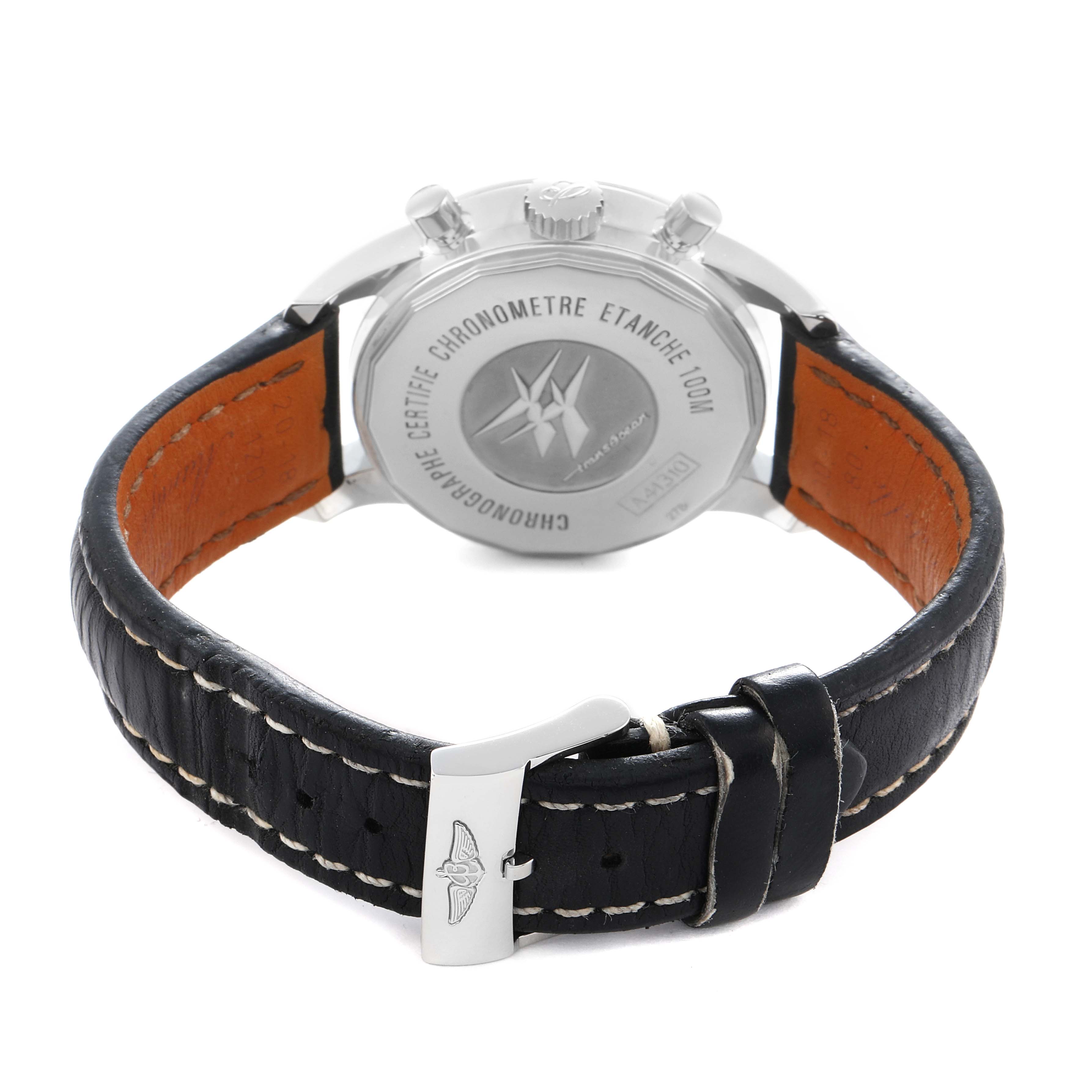 The Breitling Transocean A41310 Men
s Stainless Steel Black Dial watch is shown from the back, featuring its case back, leather strap, and clasp.