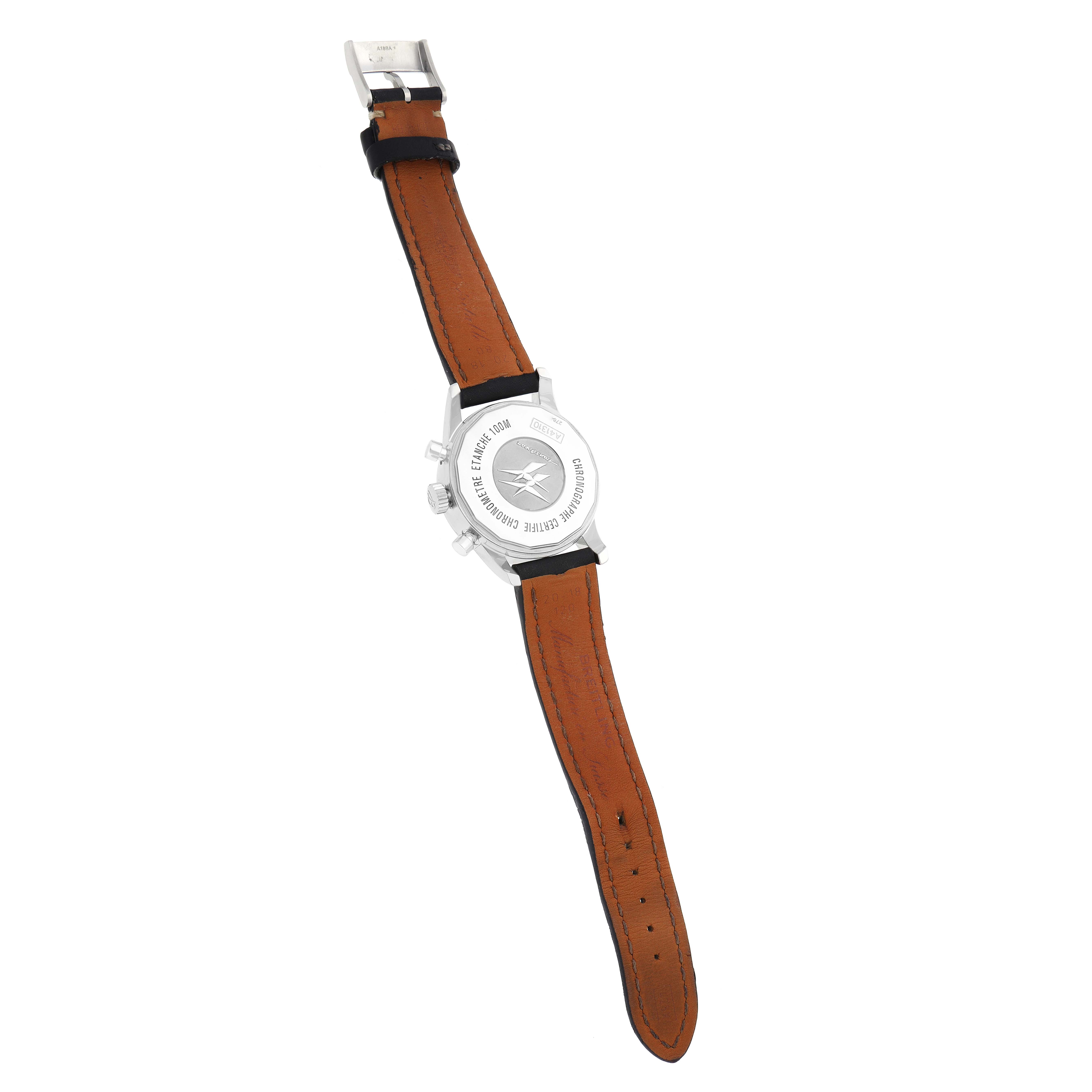 The Breitling Transocean A41310 Men
s Stainless Steel Black Dial watch is shown from the back, highlighting the case back and leather strap.