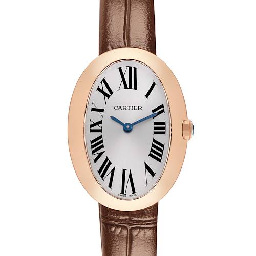 The image shows a frontal view of the Cartier Baignoire W8000007 Women's Rose Gold Silver Dial watch, featuring an oval face, Roman numerals, and a brown leather strap.