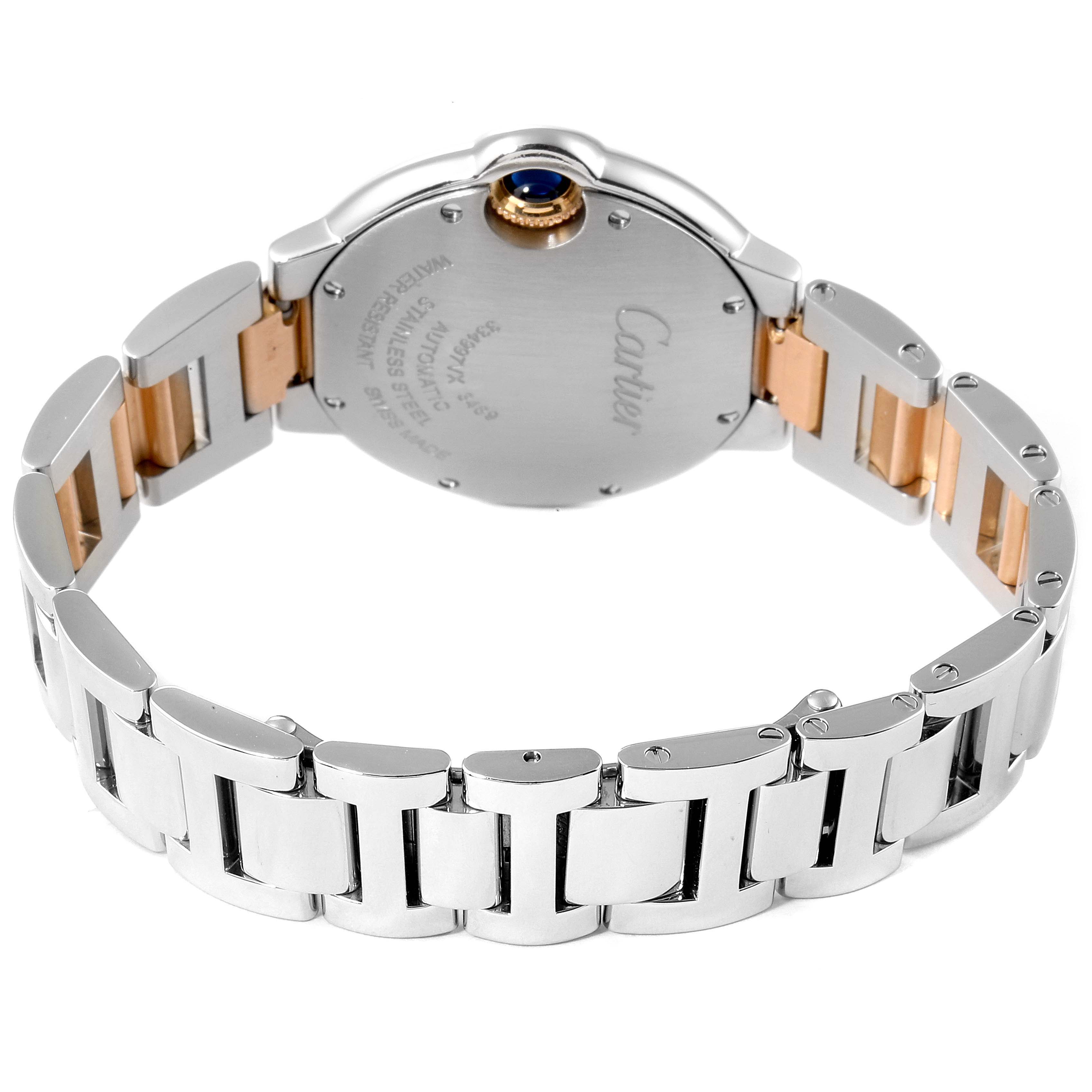The image shows the back and bracelet of a Ballon Bleu de Cartier watch, highlighting the clasp and case back.