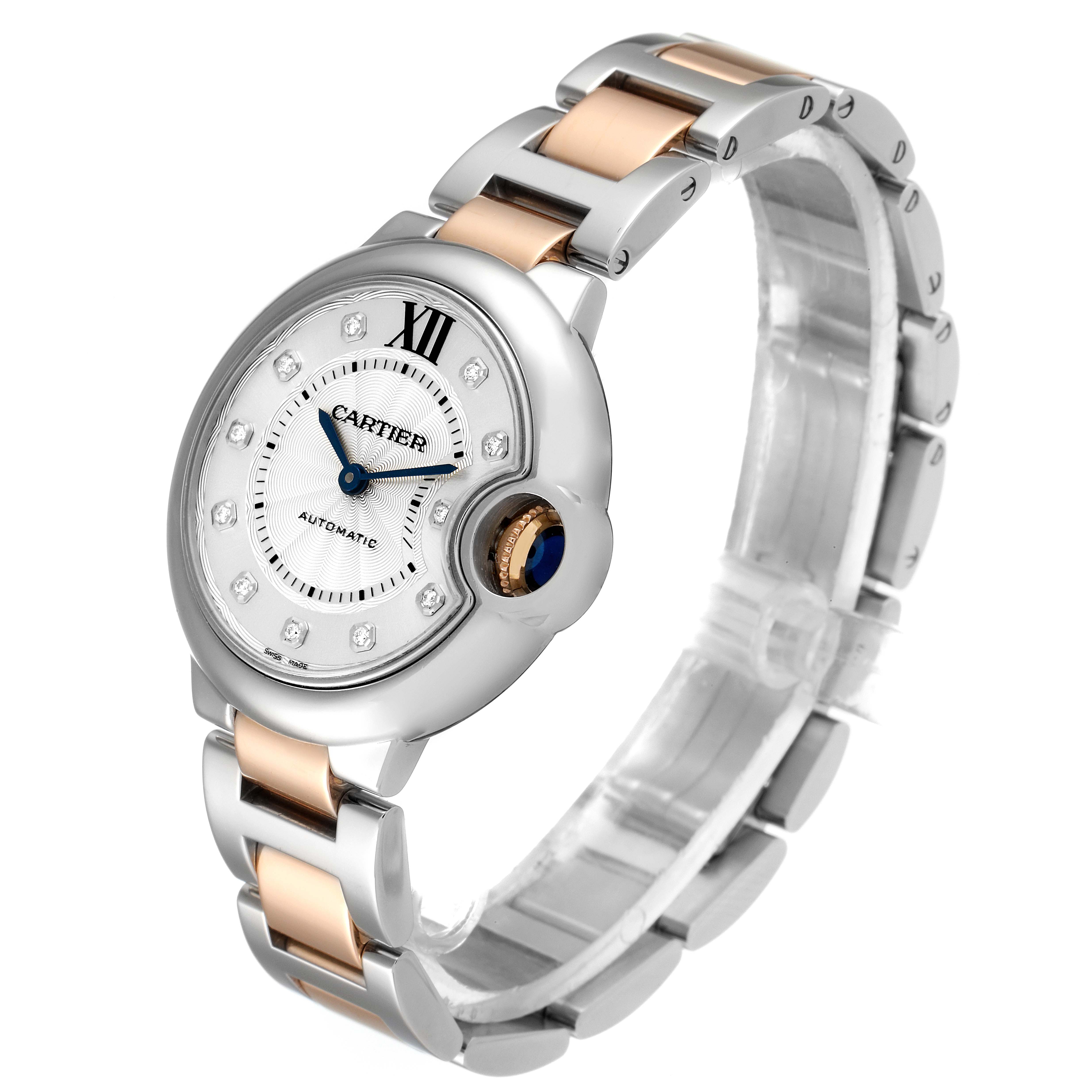 The image shows a Cartier Ballon Bleu WE902061 Women's Steel and Gold (two tone) Silver Dial WE902061 Women's Steel and Gold (two tone) Silver Dial watch at a front-left angle, highlighting its bracelet and dial.