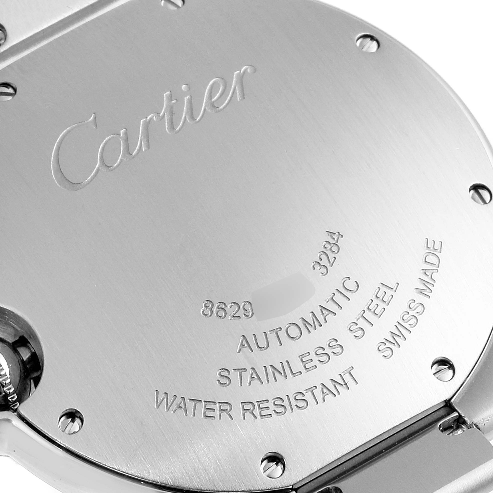 This image shows the back case of a Ballon Bleu model by Cartier, highlighting its engravings and screws.