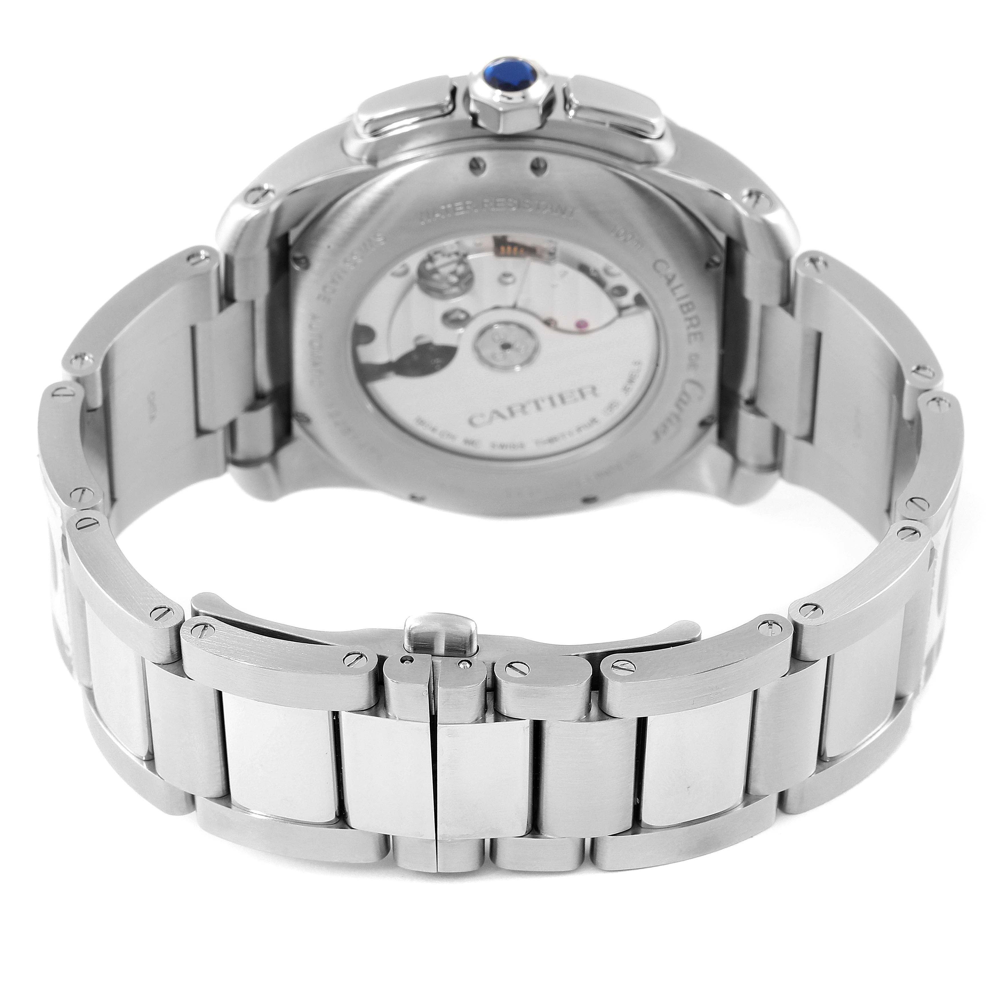 The image shows the back view of the Calibre de Cartier watch by Cartier, highlighting the movement and bracelet.