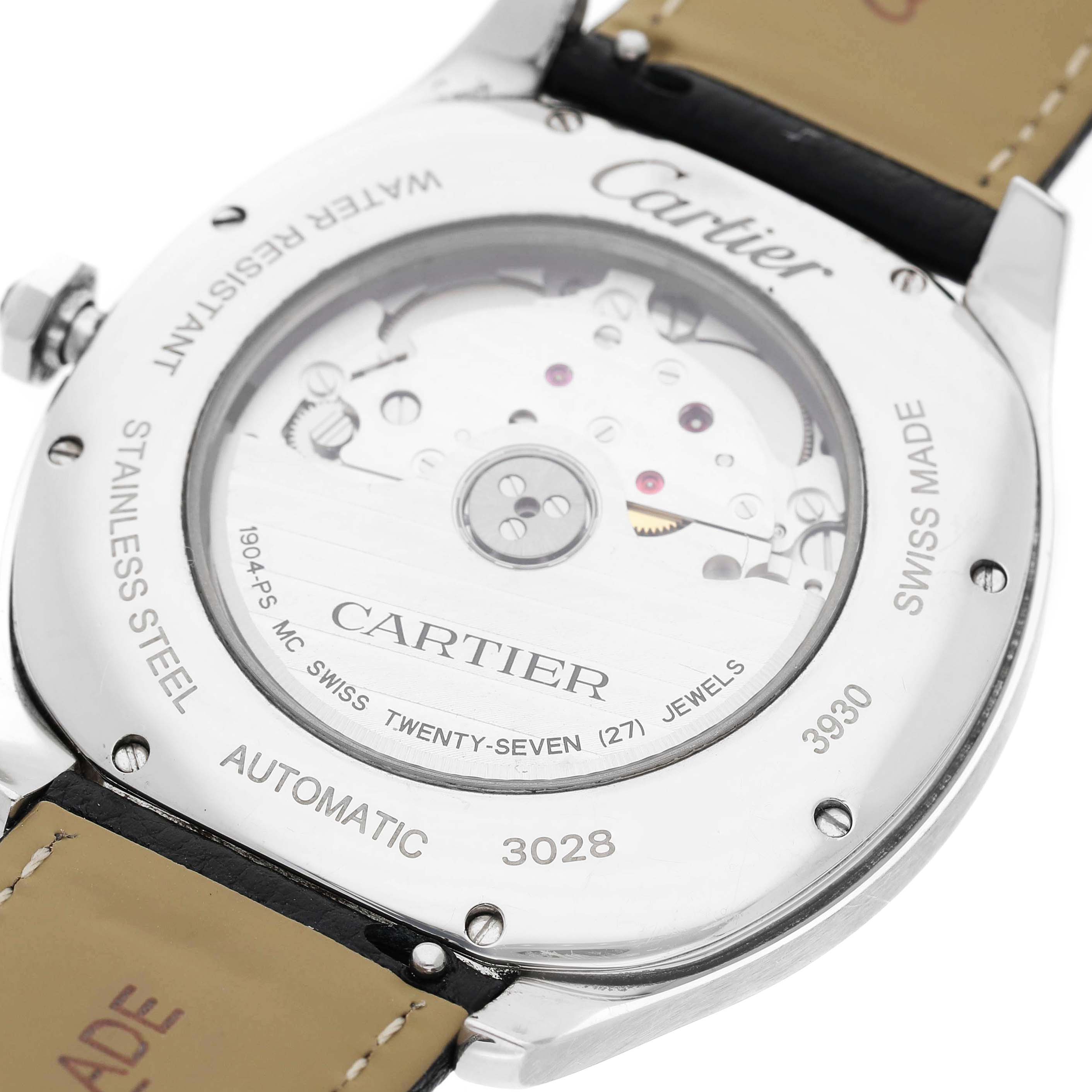 The image shows the back view of a Drive de Cartier watch, highlighting its automatic movement and intricate details.