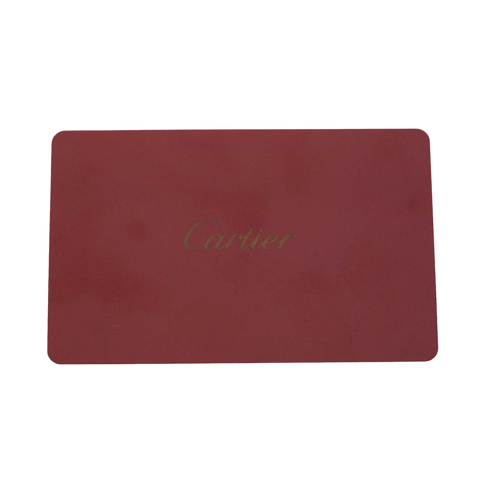 The image shows a red Cartier card, likely an accessory for the Drive de Cartier watch.