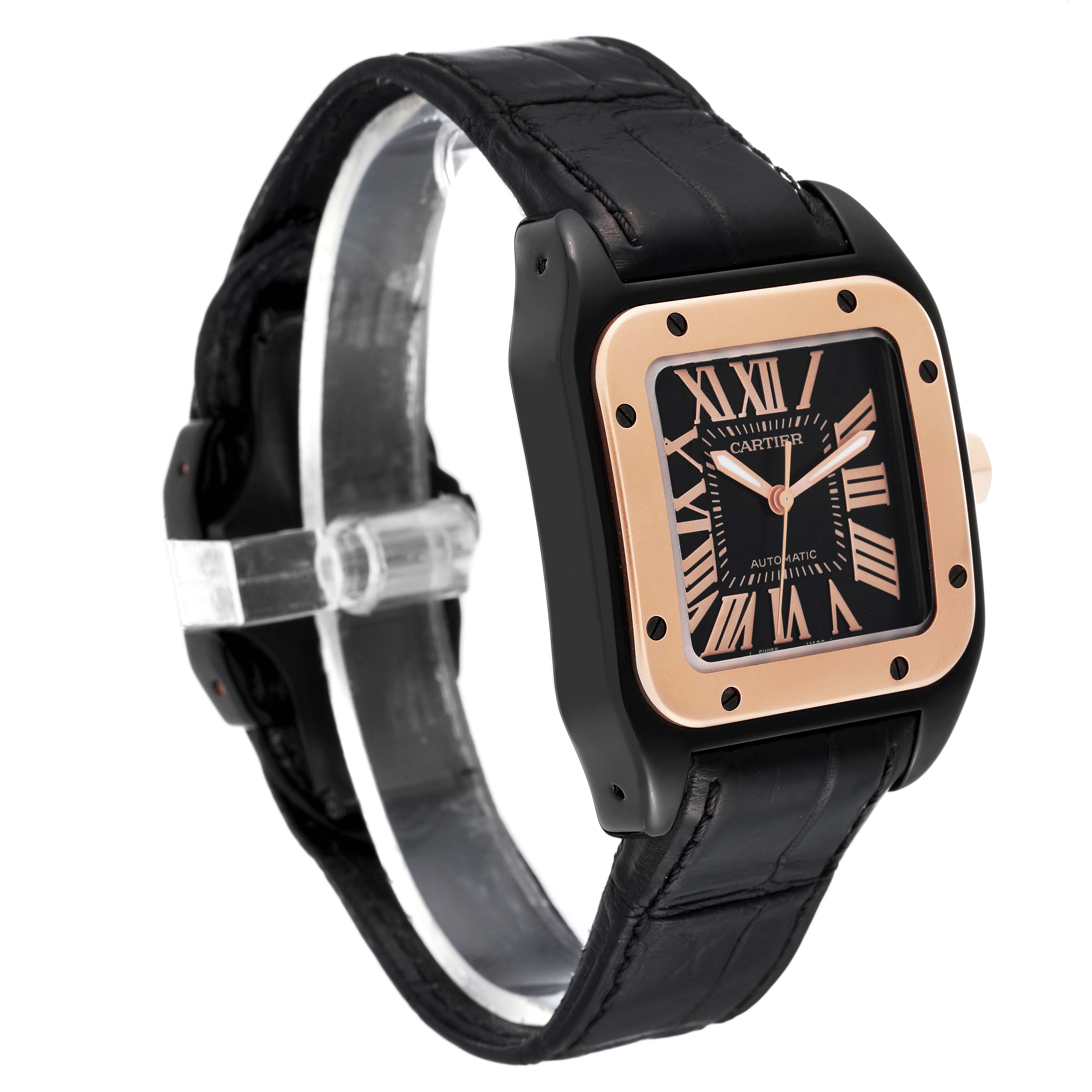 The Cartier Santos W2020009 Men
s Stainless Steel Black Dial W2020009 Men
s Stainless Steel Black Dial watch is shown at an angle displaying the face, bezel, and black leather strap.