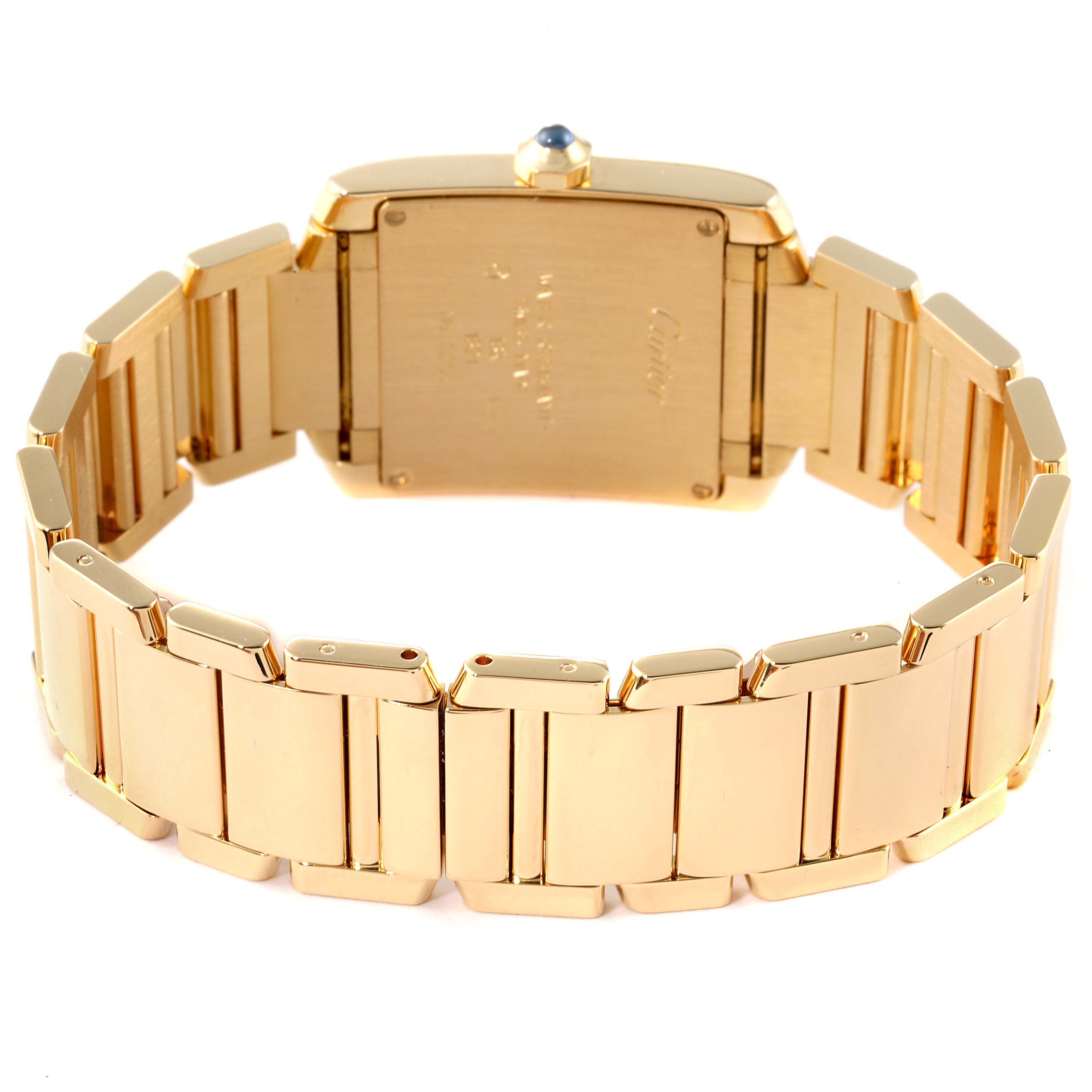 The image shows the back and bracelet of a Cartier Tank Francaise W50003N2 Women's Yellow Gold Silver Dial W50003N2 Women's Yellow Gold Silver Dial watch, highlighting its gold links and caseback.