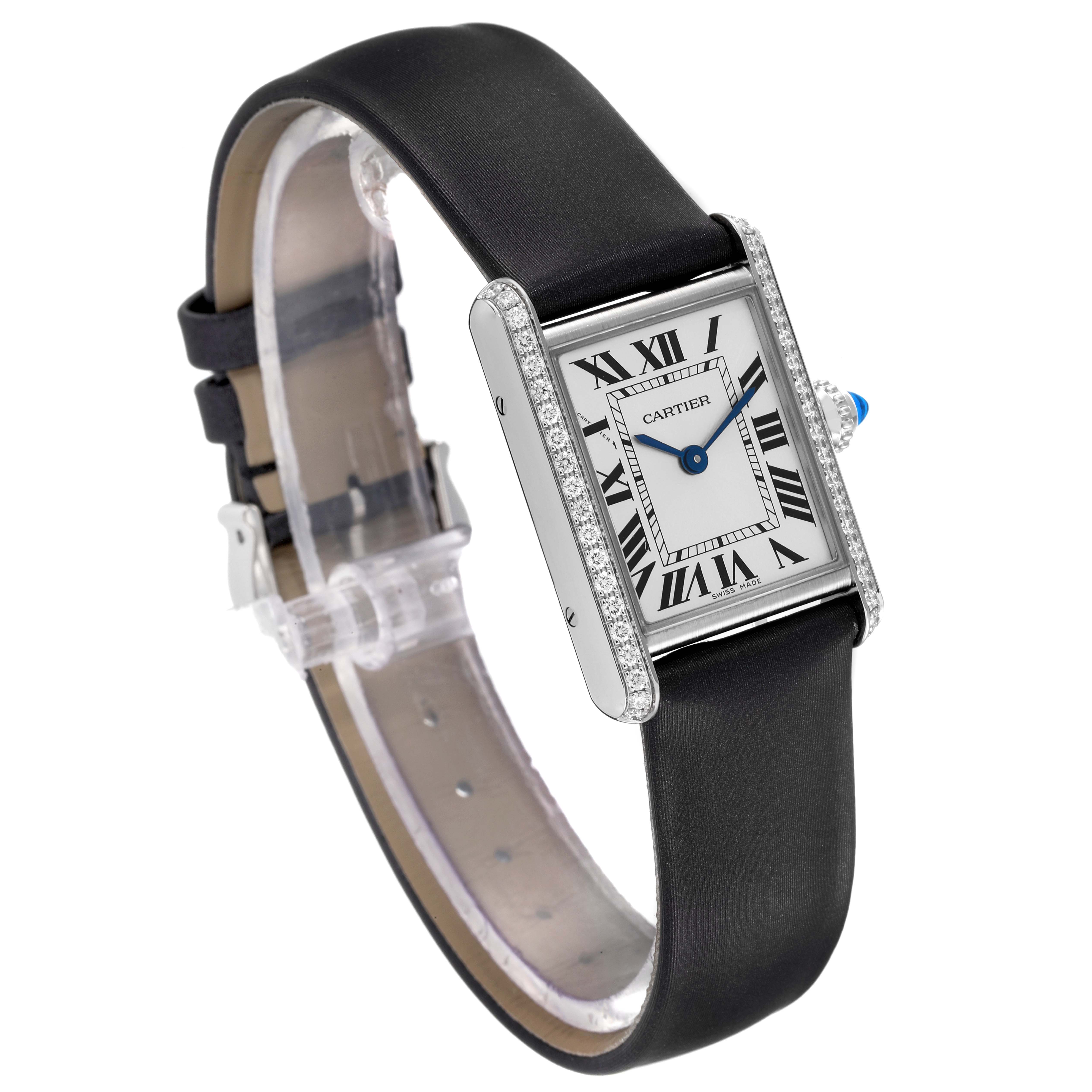 The image shows a Cartier Tank Must W4TA0016 Women's Stainless Steel Silver Dial W4TA0016 Women's Stainless Steel Silver Dial model watch from an angled front view, highlighting its rectangular face and black leather strap.