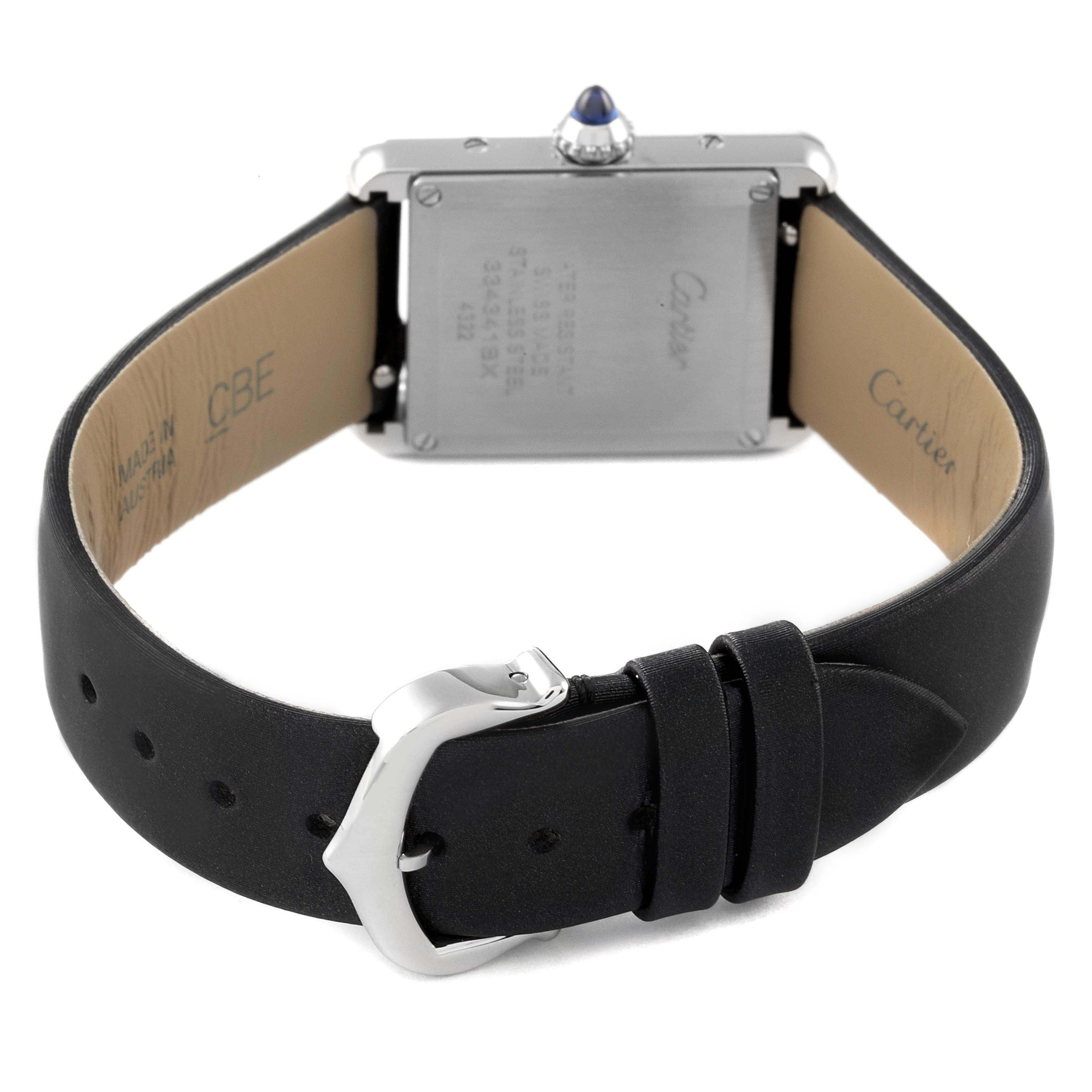 The image shows the back view of the Cartier Tank Must W4TA0016 Women's Stainless Steel Silver Dial W4TA0016 Women's Stainless Steel Silver Dial watch, highlighting the case back, strap, buckle, and crown.