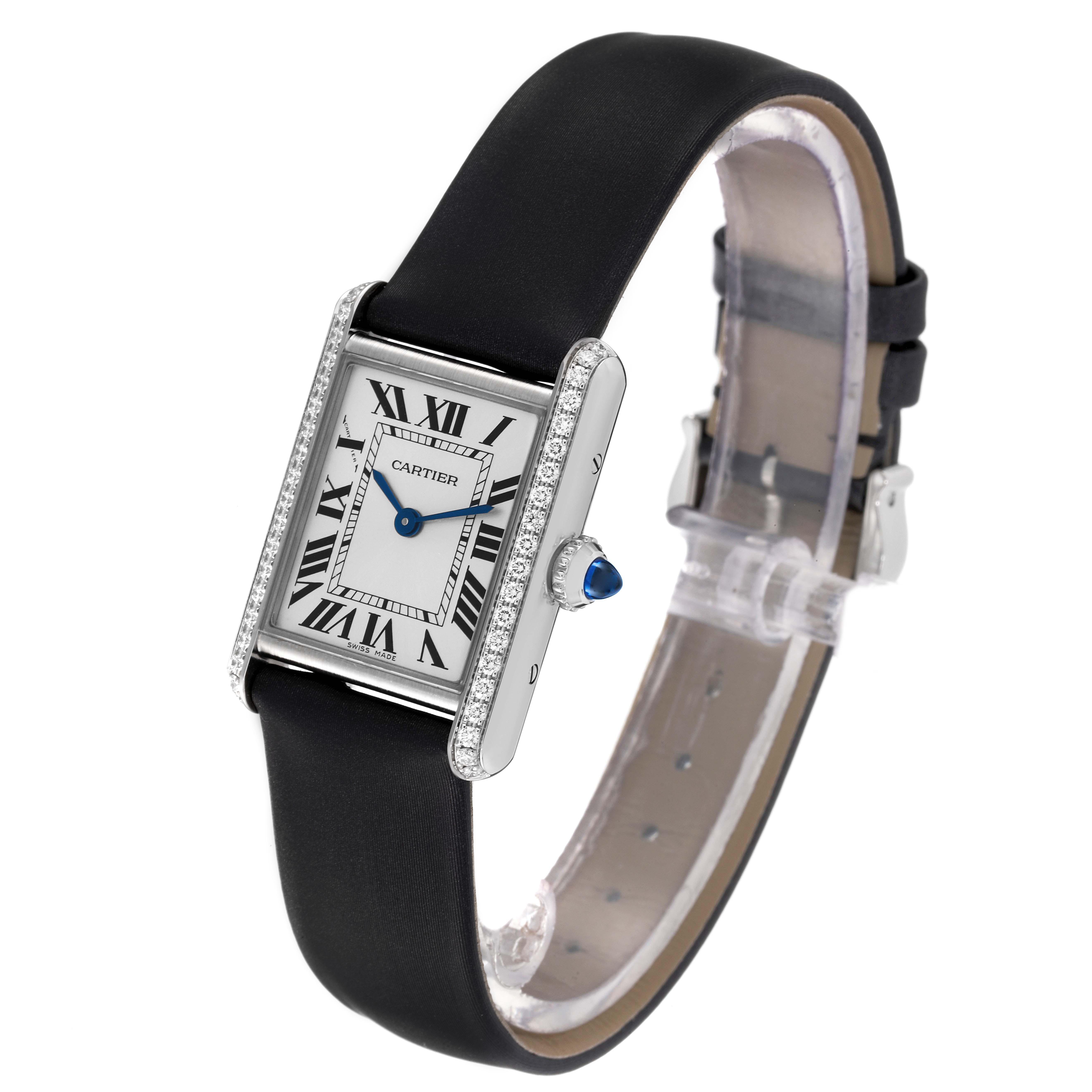 The image shows the Cartier Tank Must W4TA0016 Women's Stainless Steel Silver Dial W4TA0016 Women's Stainless Steel Silver Dial watch at a slight side angle, highlighting the face, bezel, and leather strap.