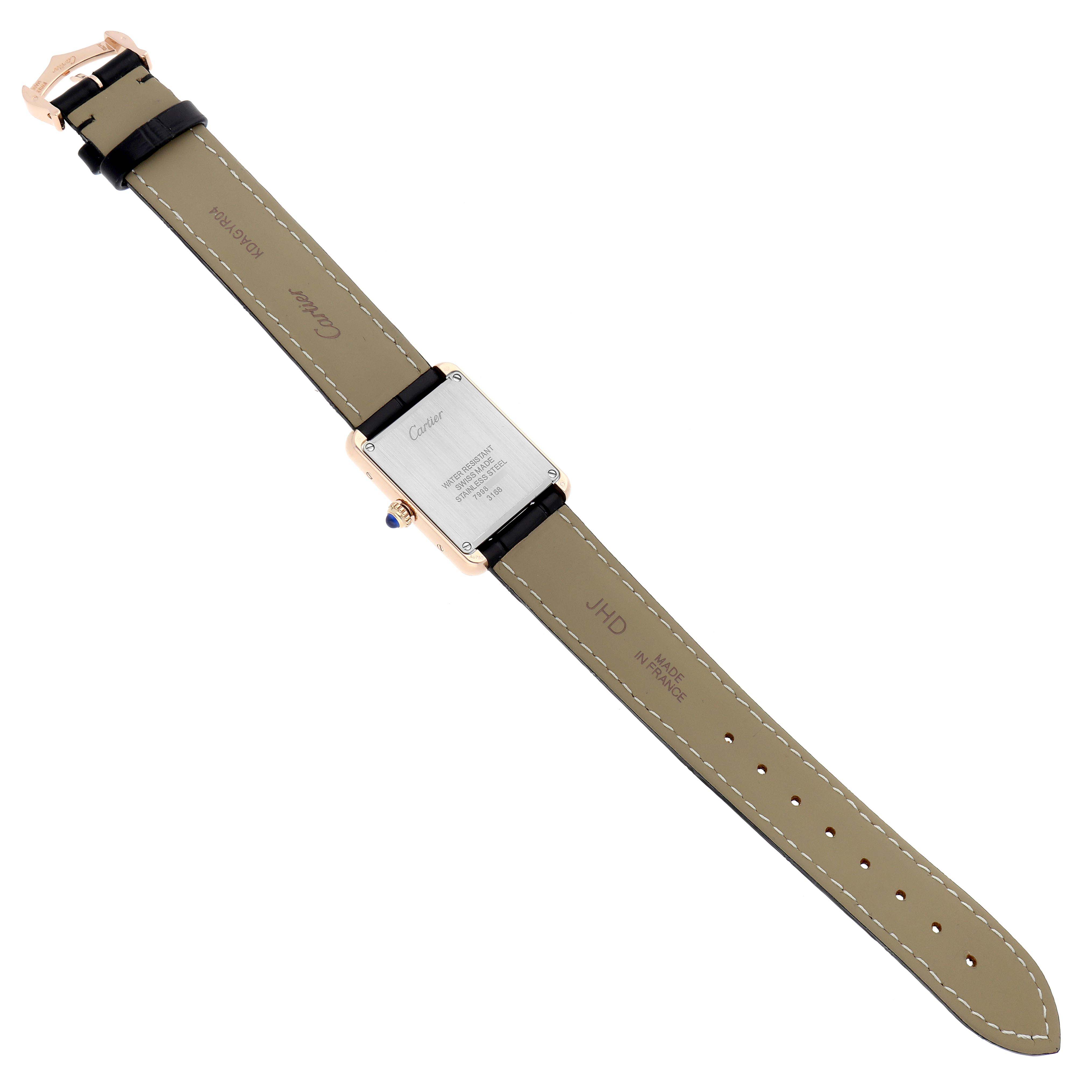 The image shows the back view of a Cartier Tank Solo W5200002 Women
s Steel and Gold (two tone) Silver Dial watch, highlighting the case back, strap, and buckle.