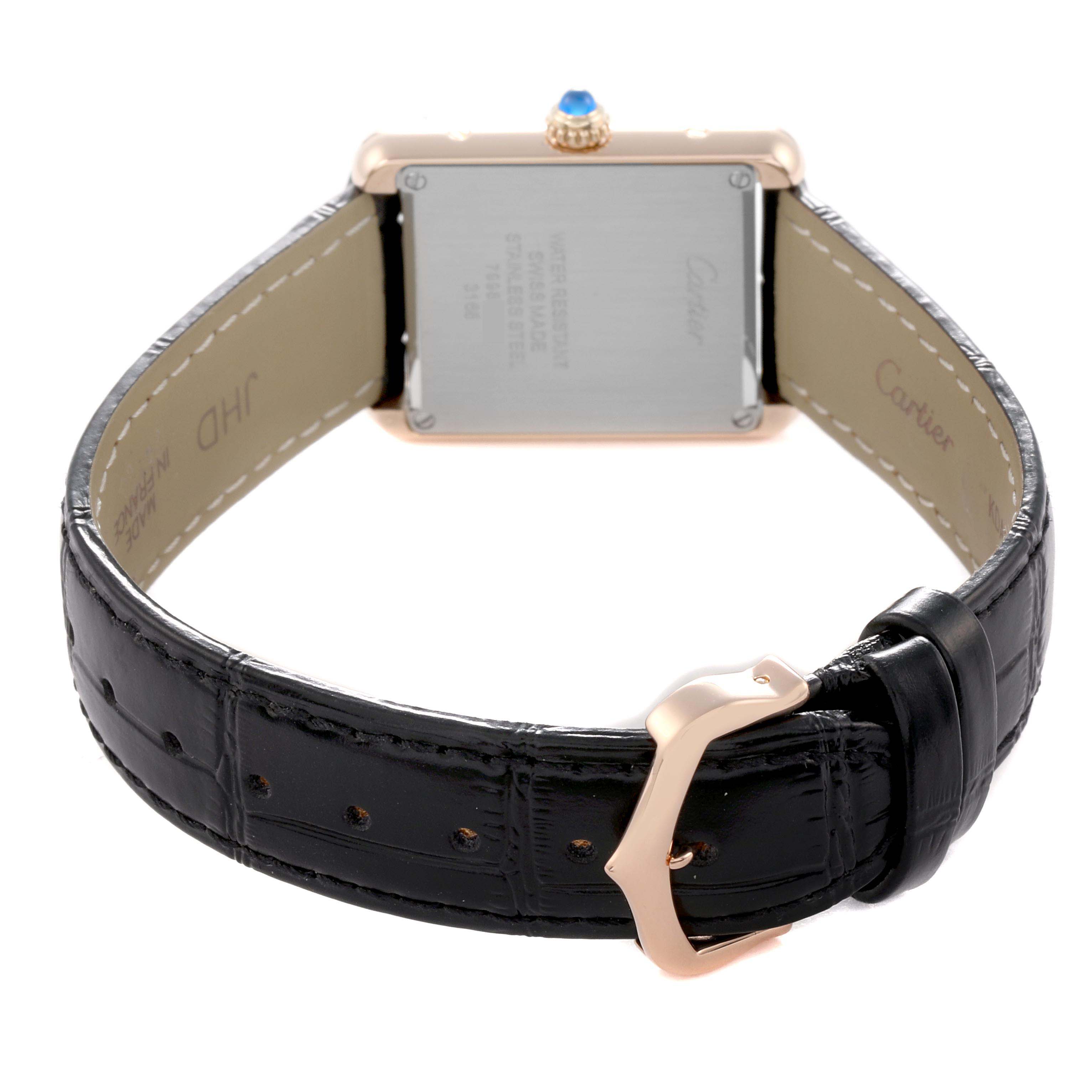 The Cartier Tank Solo W5200002 Women
s Steel and Gold (two tone) Silver Dial watch is shown from the rear, highlighting the case back, strap, and buckle.