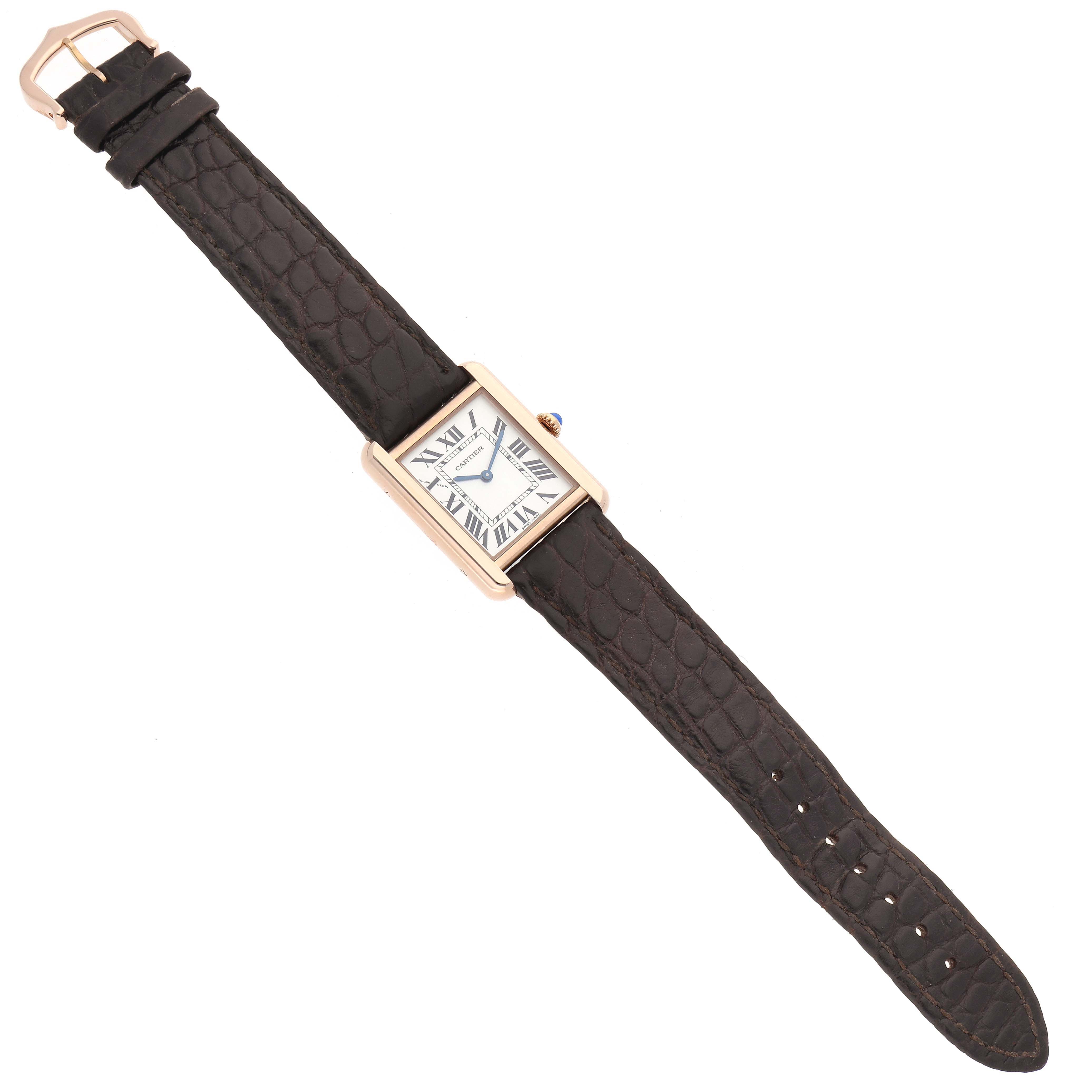 The Cartier Tank Solo W5200024 Women
s Rose Gold Silver Dial watch is shown from a top-down angle, displaying the entire face, strap, and buckle.