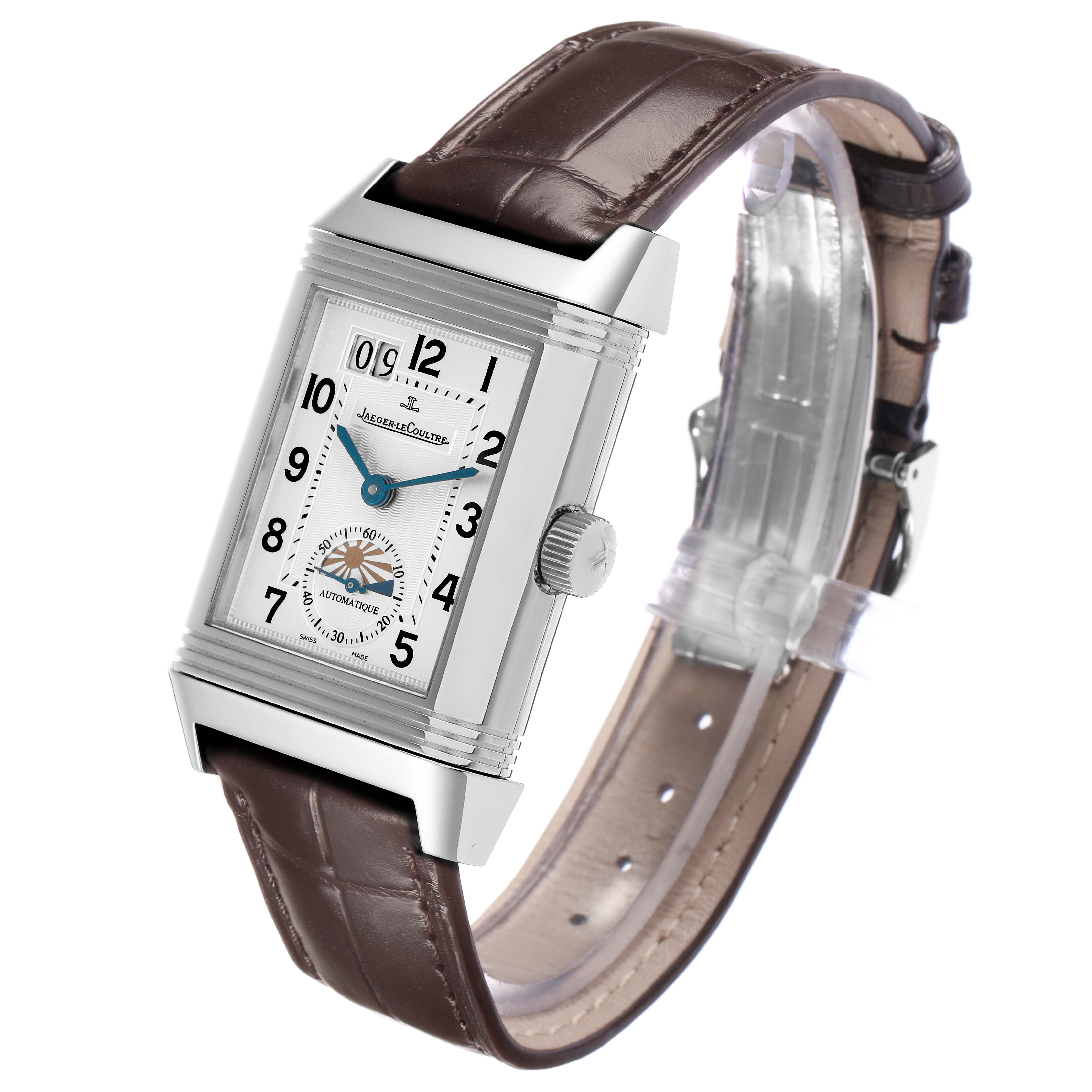 The Jaeger LeCoultre Reverso Q3038420 Men
s Stainless Steel Silver Dial is shown at an angled side view, featuring the rectangular case, crown, and leather strap.