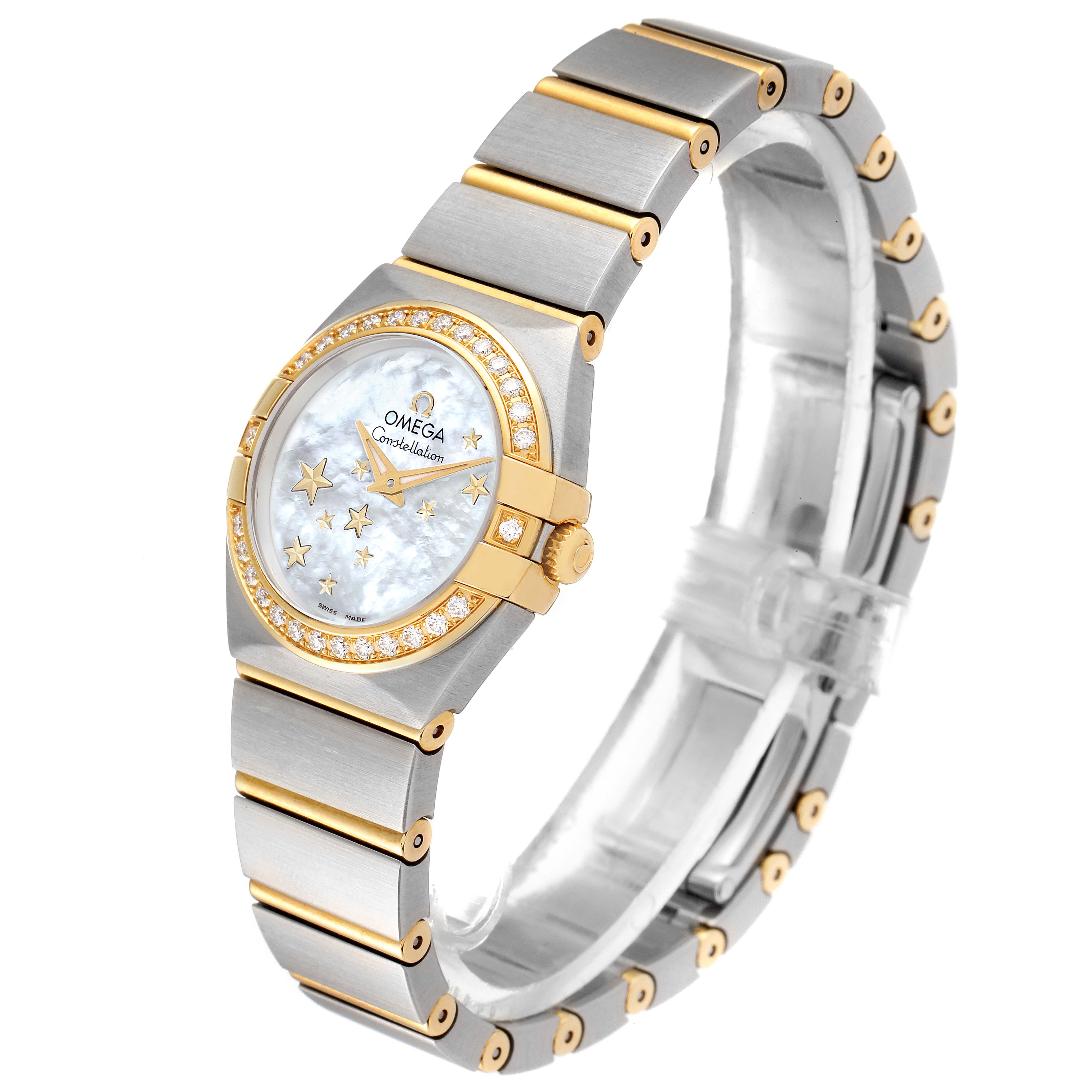 The Omega 123.25.24.60.05.001 Women's Steel and Gold (two tone) Mother of Pearl Dial 123.25.24.60.05.001 Women's Steel and Gold (two tone) Mother of Pearl Dial Constellation Star Steel Yellow Gold Diamond Ladies Watch 123.25.24.60.05.001 is shown at a slight angle highlighting the face, bezel, and bracelet.