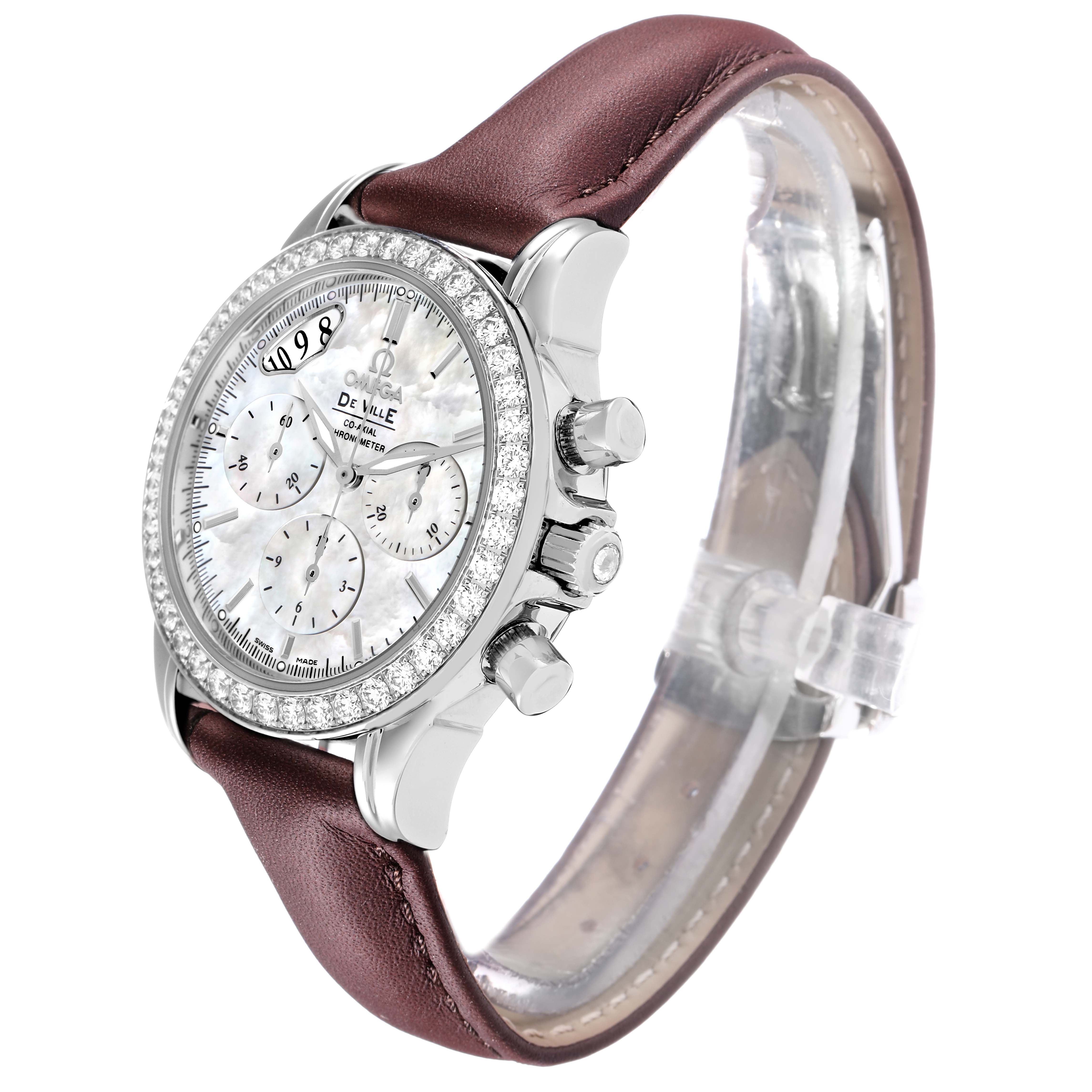 The Omega De Ville 4877.70.36 Men
s Stainless Steel Mother of Pearl Dial watch is shown from a side angle, featuring the bezel, crown, chronograph buttons, and leather strap.