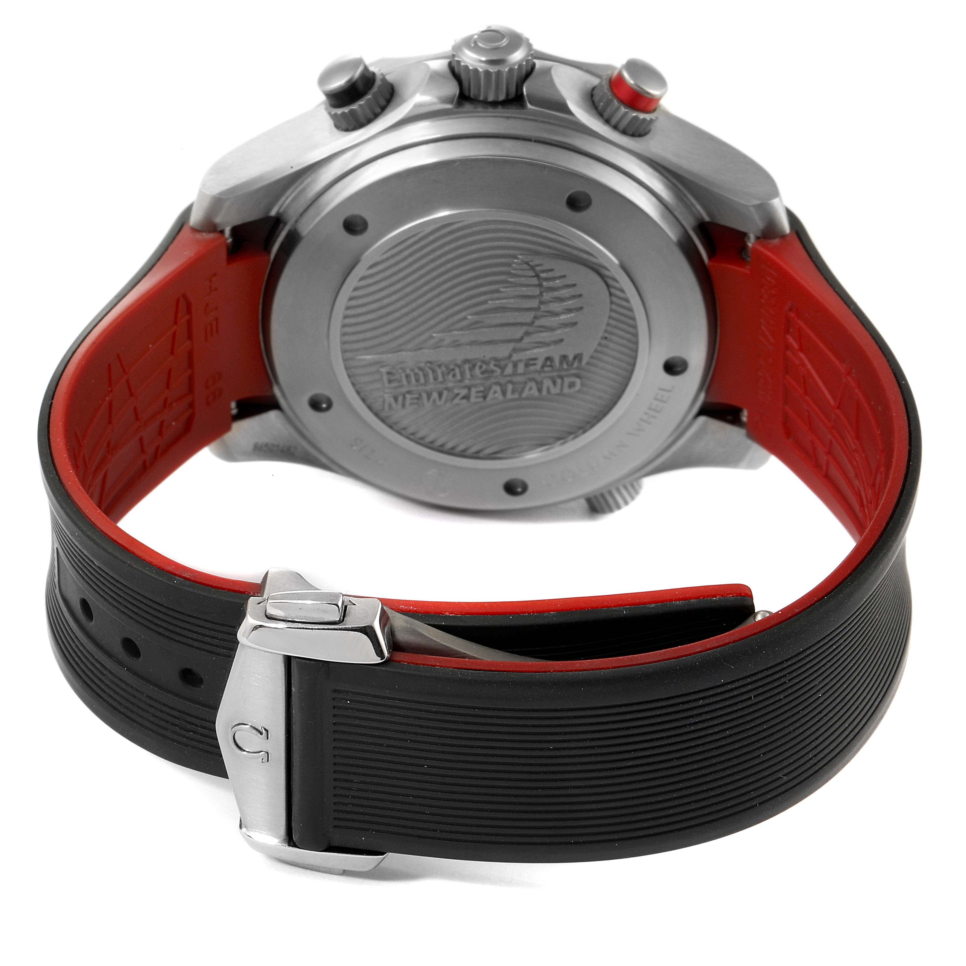 The image shows the back and strap of an Omega Seamaster 212.92.44.50.99.001 Men's Titanium Grey Dial 212.92.44.50.99.001 Men's Titanium Grey Dial watch, highlighting the case back and the black and red rubber strap with a silver buckle.
