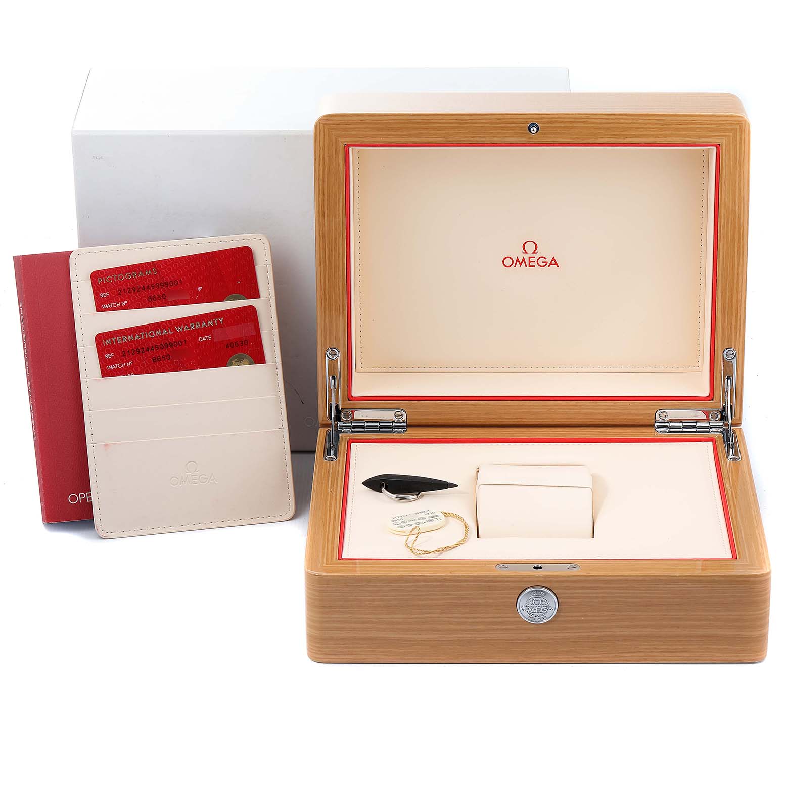 This image shows Omega Seamaster 212.92.44.50.99.001 Men's Titanium Grey Dial 212.92.44.50.99.001 Men's Titanium Grey Dial watch accessories, including a wooden display box, warranty cards, and a small pouch.