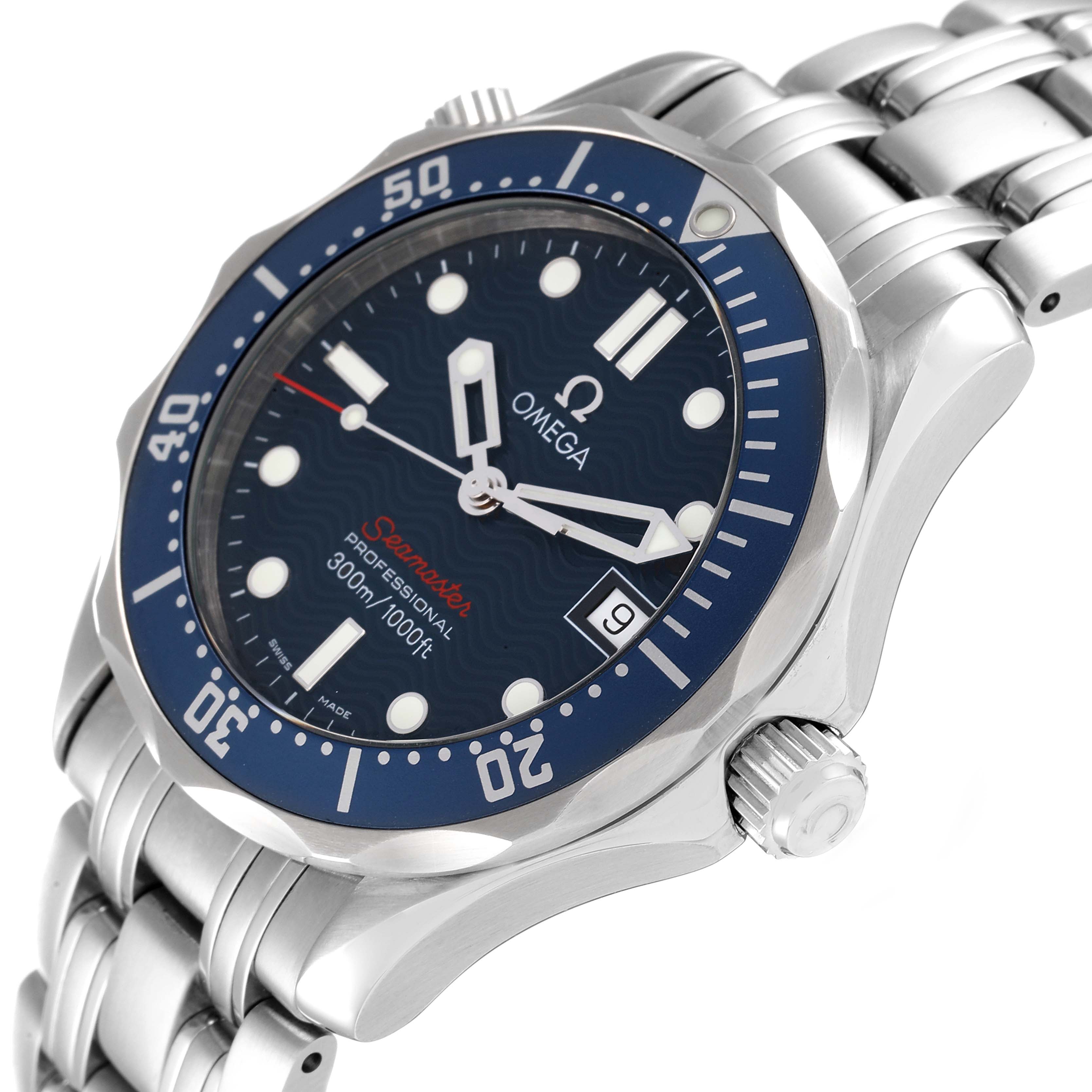 This image shows the face, crown, and top portion of the bracelet of an Omega Seamaster 2223.80.00 Men's Stainless Steel Blue Dial 2223.80.00 Men's Stainless Steel Blue Dial watch from an angled perspective.